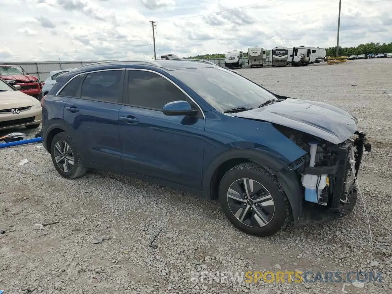 4 Photograph of a damaged car KNDCB3LC7N5546741 KIA NIRO 2022