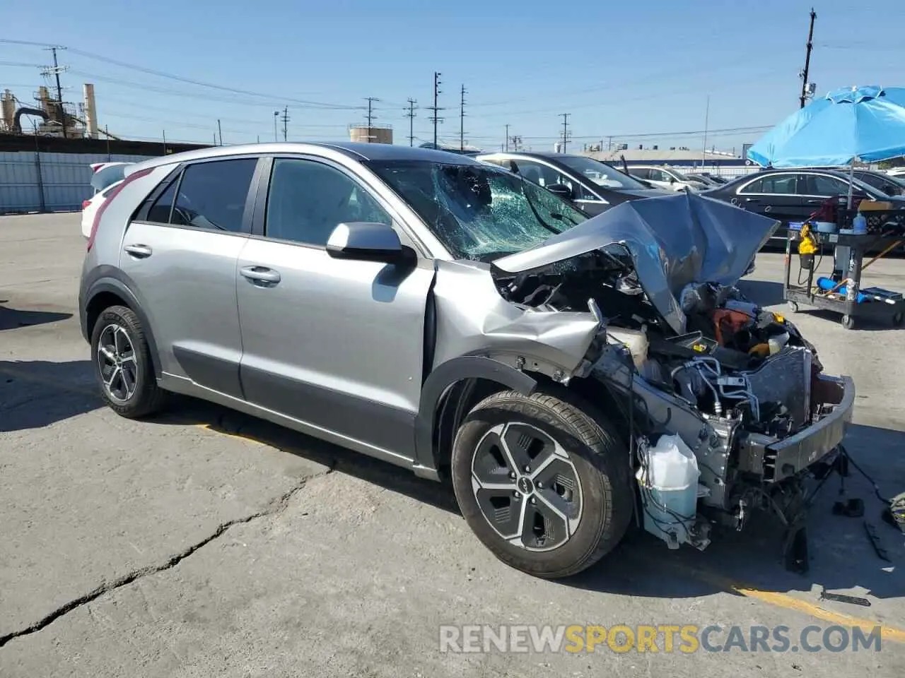 4 Photograph of a damaged car KNDCP3LE1P5066829 KIA NIRO 2023