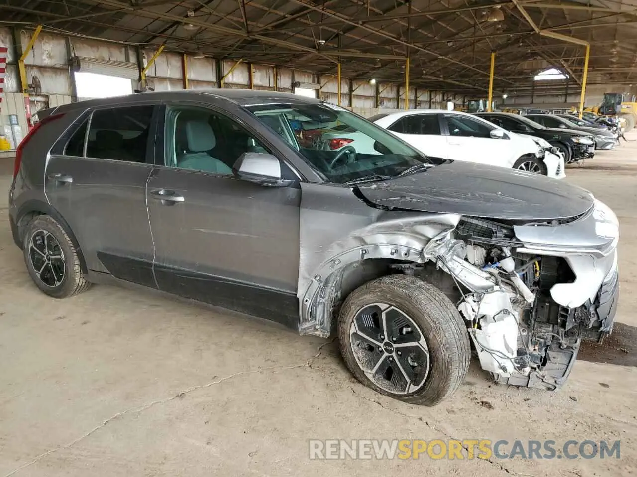 4 Photograph of a damaged car KNDCP3LE5P5069944 KIA NIRO 2023