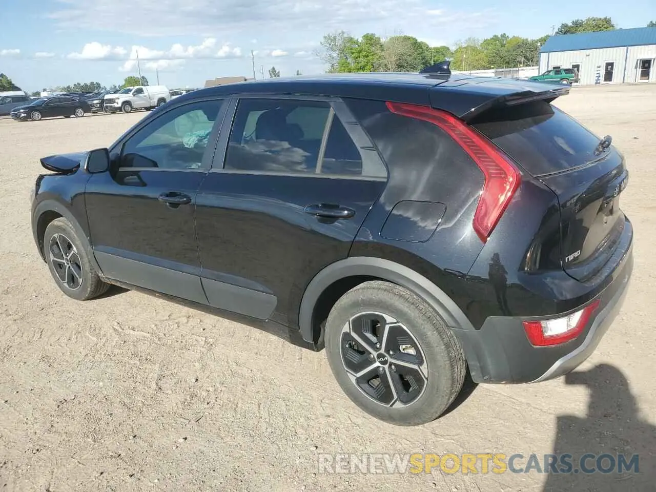2 Photograph of a damaged car KNDCP3LE6P5093184 KIA NIRO 2023