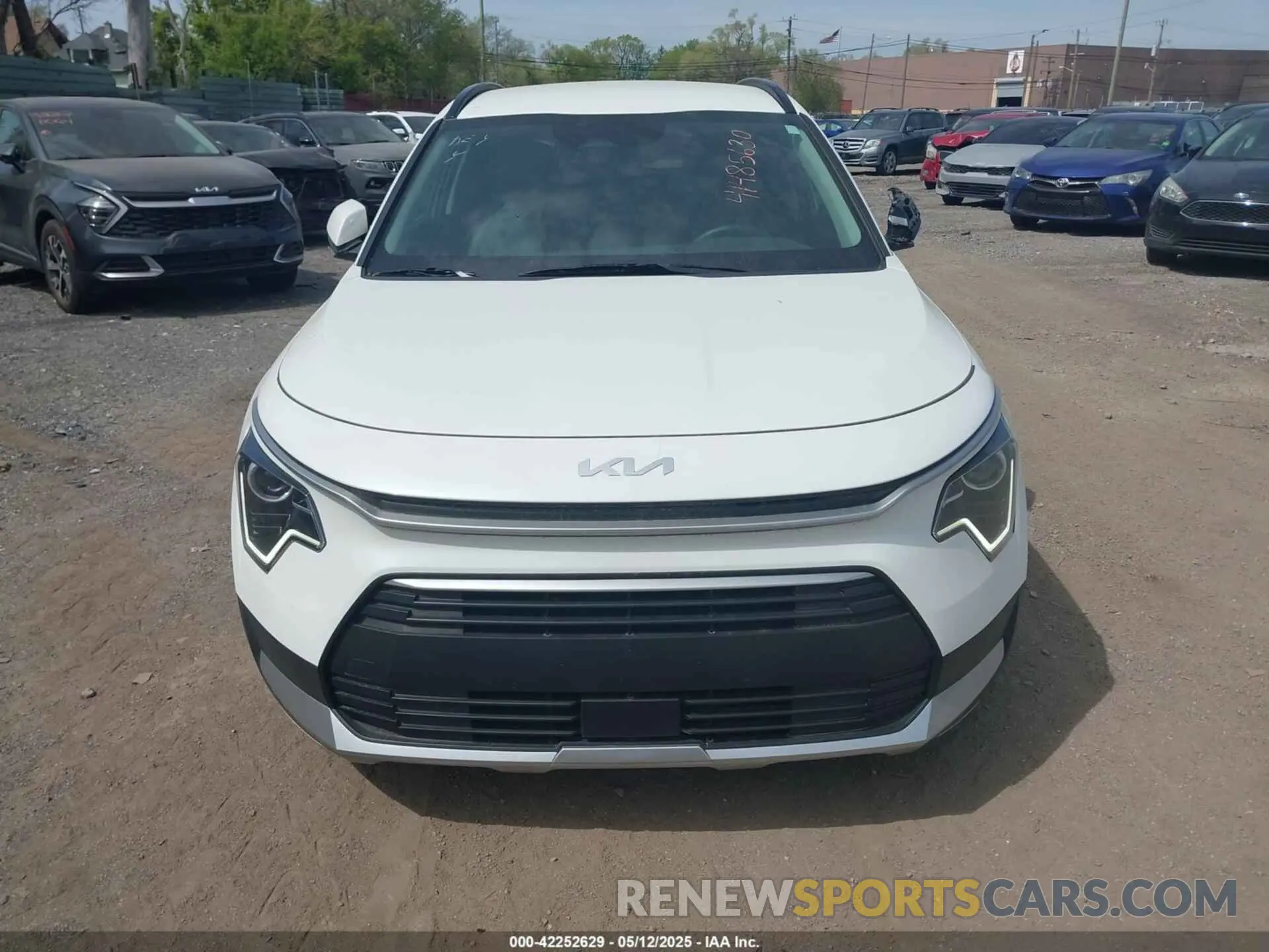 12 Photograph of a damaged car KNDCR3LE2P5057793 KIA NIRO 2023