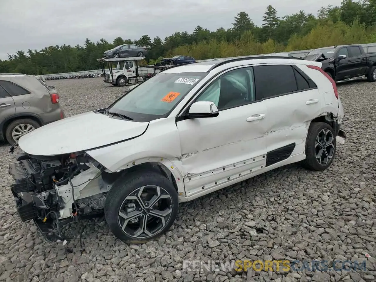 1 Photograph of a damaged car KNDCR3LE4P5106931 KIA NIRO 2023