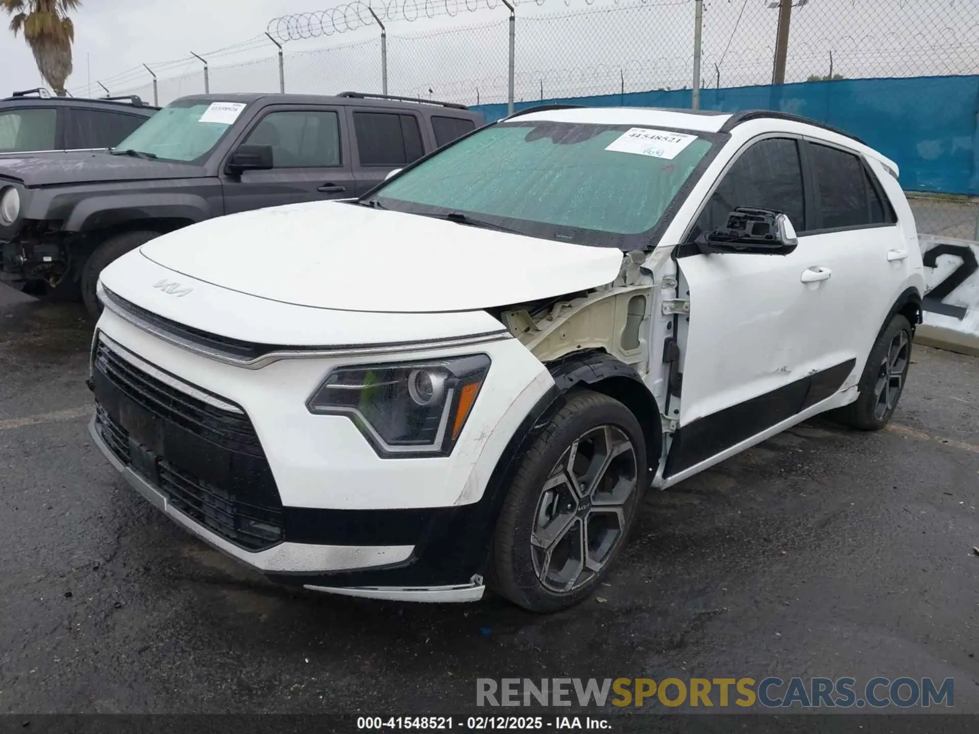 2 Photograph of a damaged car KNDCR3LE5P5033858 KIA NIRO 2023