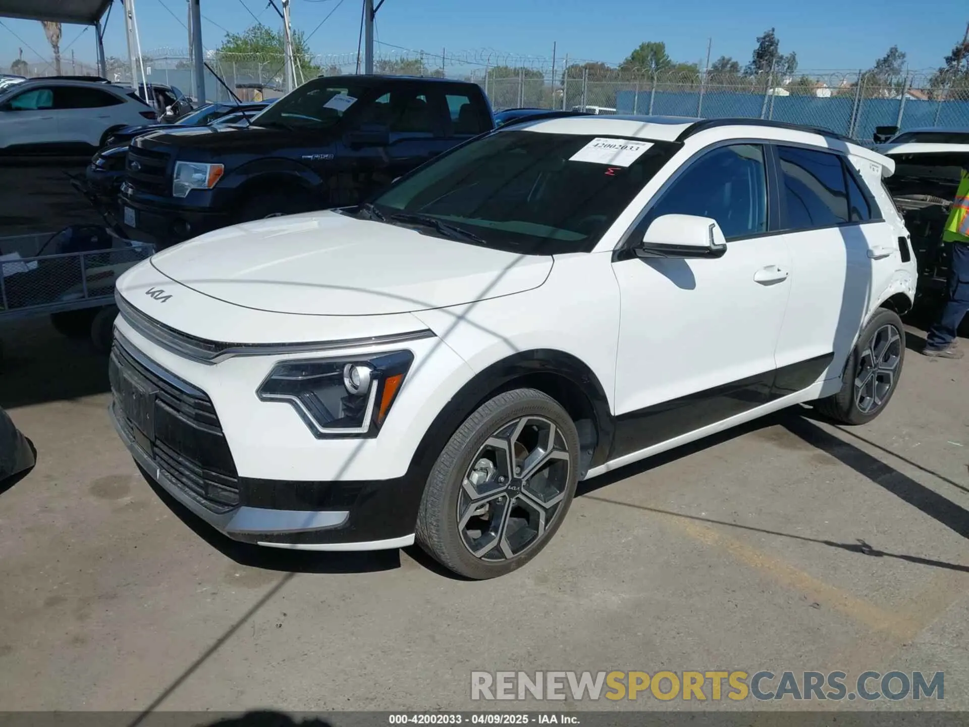 2 Photograph of a damaged car KNDCR3LEXP5043592 KIA NIRO 2023