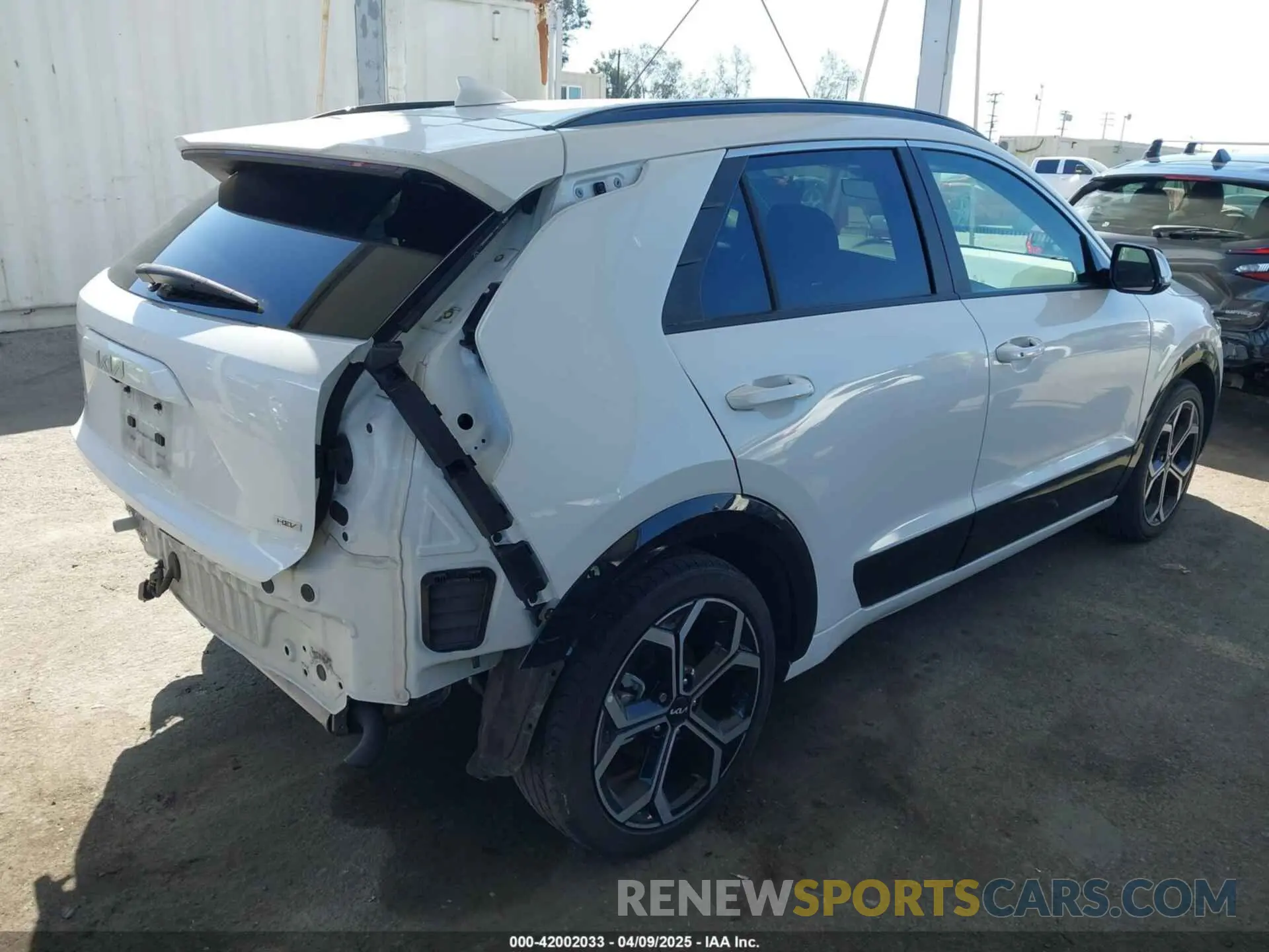 4 Photograph of a damaged car KNDCR3LEXP5043592 KIA NIRO 2023