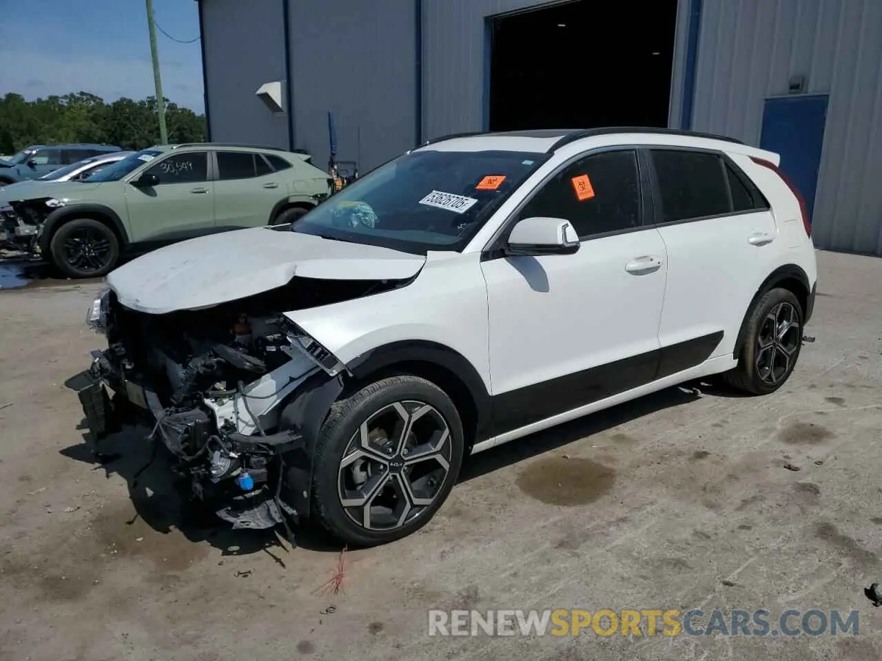 1 Photograph of a damaged car KNDCR3LEXP5058092 KIA NIRO 2023