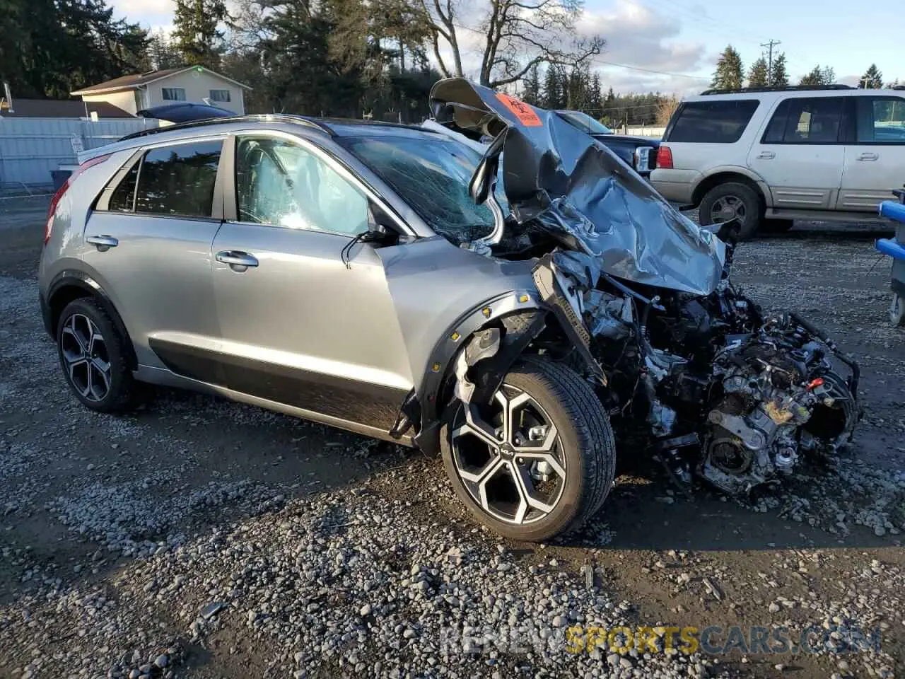 4 Photograph of a damaged car KNDCR3LE0R5138438 KIA NIRO 2024