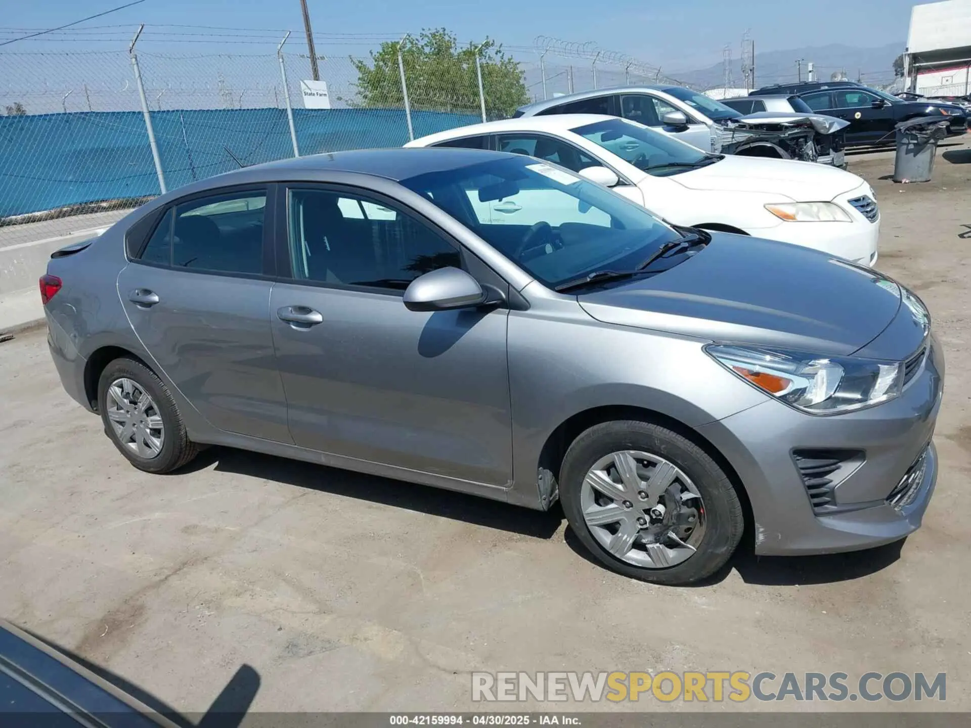 13 Photograph of a damaged car 3KPA24AD9NE477872 KIA RIO 2022