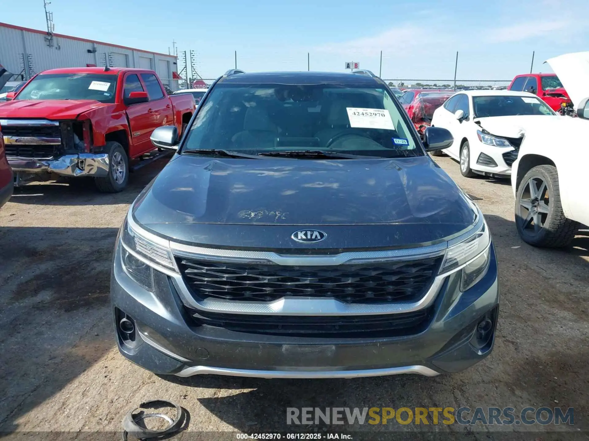 12 Photograph of a damaged car KNDERCAA9M7089049 KIA SELTOS 2021