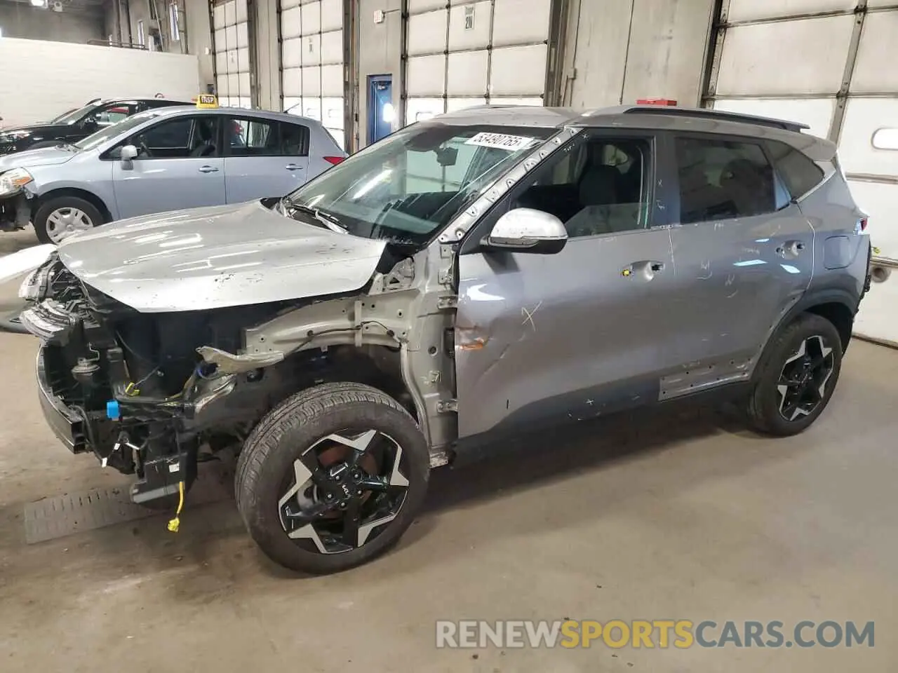 1 Photograph of a damaged car KNDER2AA0R7581163 KIA SELTOS 2024