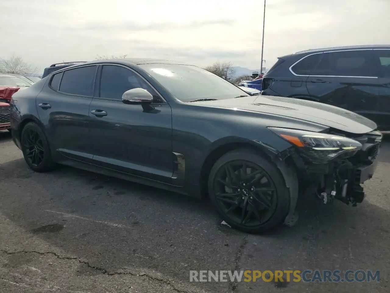 4 Photograph of a damaged car KNAE35LD8N6113477 KIA STINGER 2022
