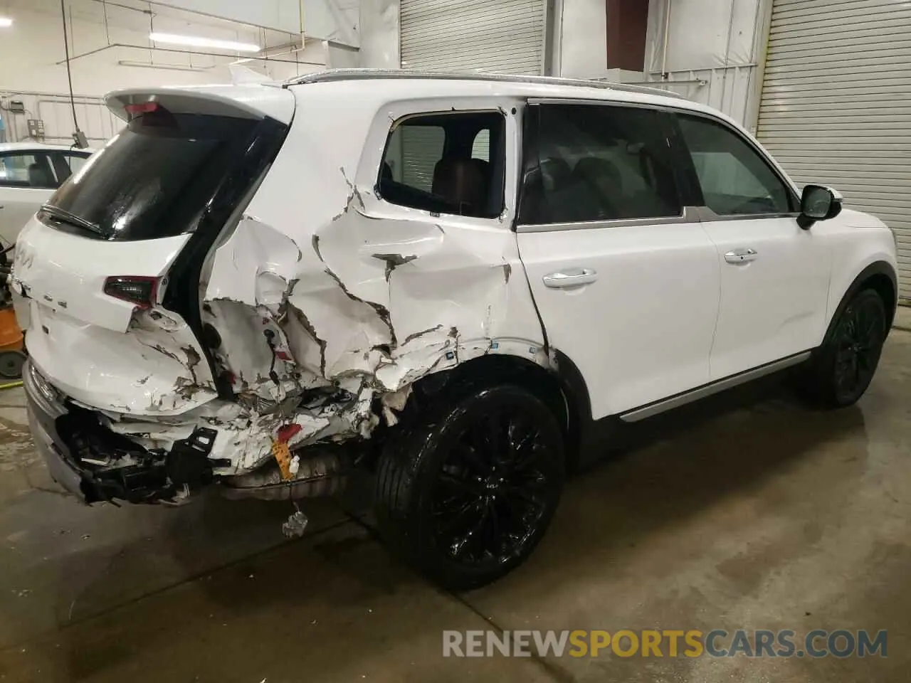 3 Photograph of a damaged car 5XYP5DHC3NG290774 KIA TELLURIDE 2022