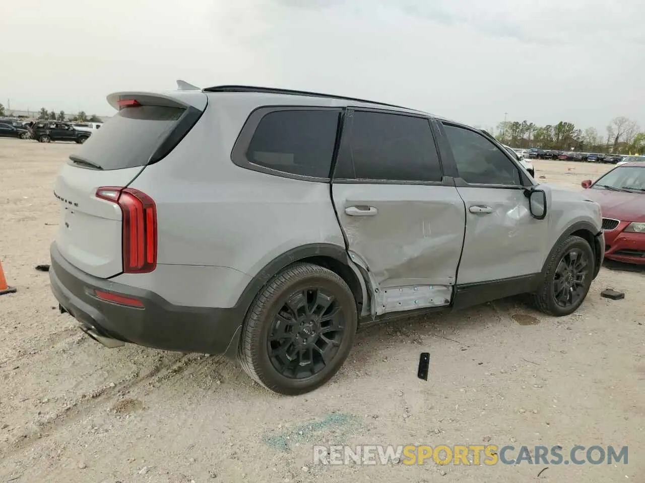 3 Photograph of a damaged car 5XYP5DHC4NG212410 KIA TELLURIDE 2022