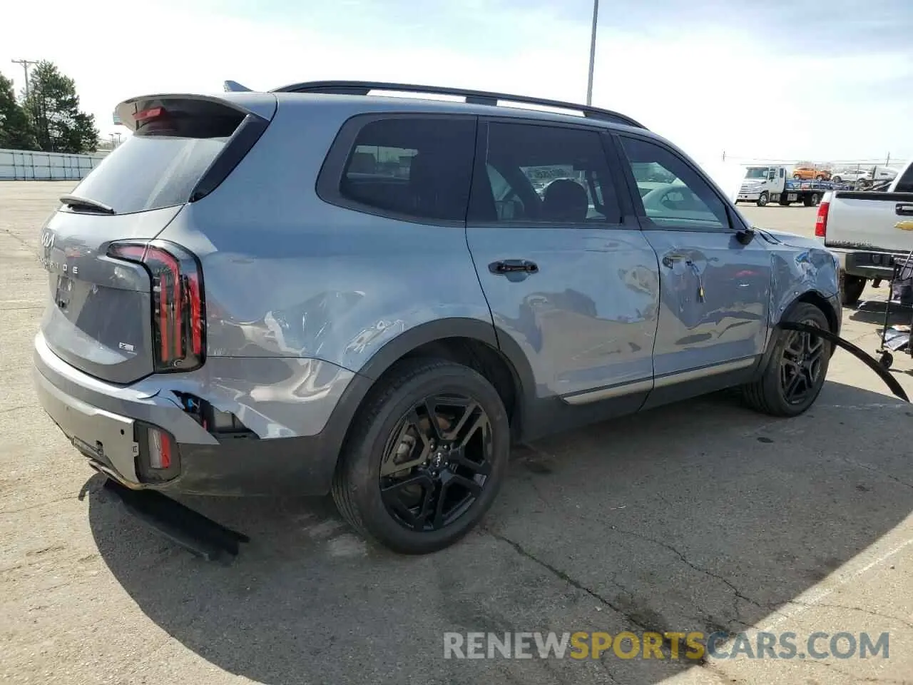 3 Photograph of a damaged car 5XYP3DGC0PG339164 KIA TELLURIDE 2023