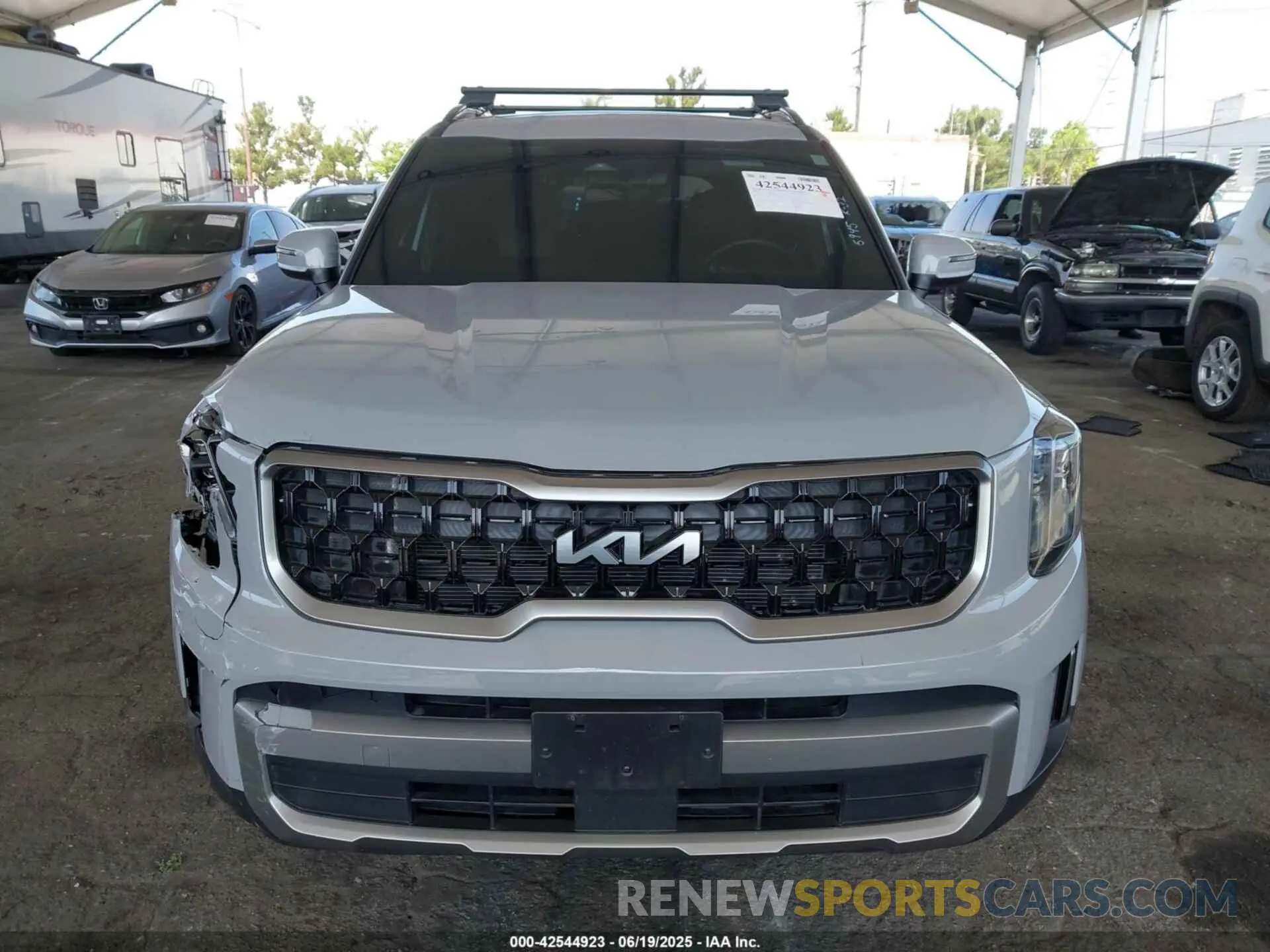 12 Photograph of a damaged car 5XYP3DGC0PG395945 KIA TELLURIDE 2023