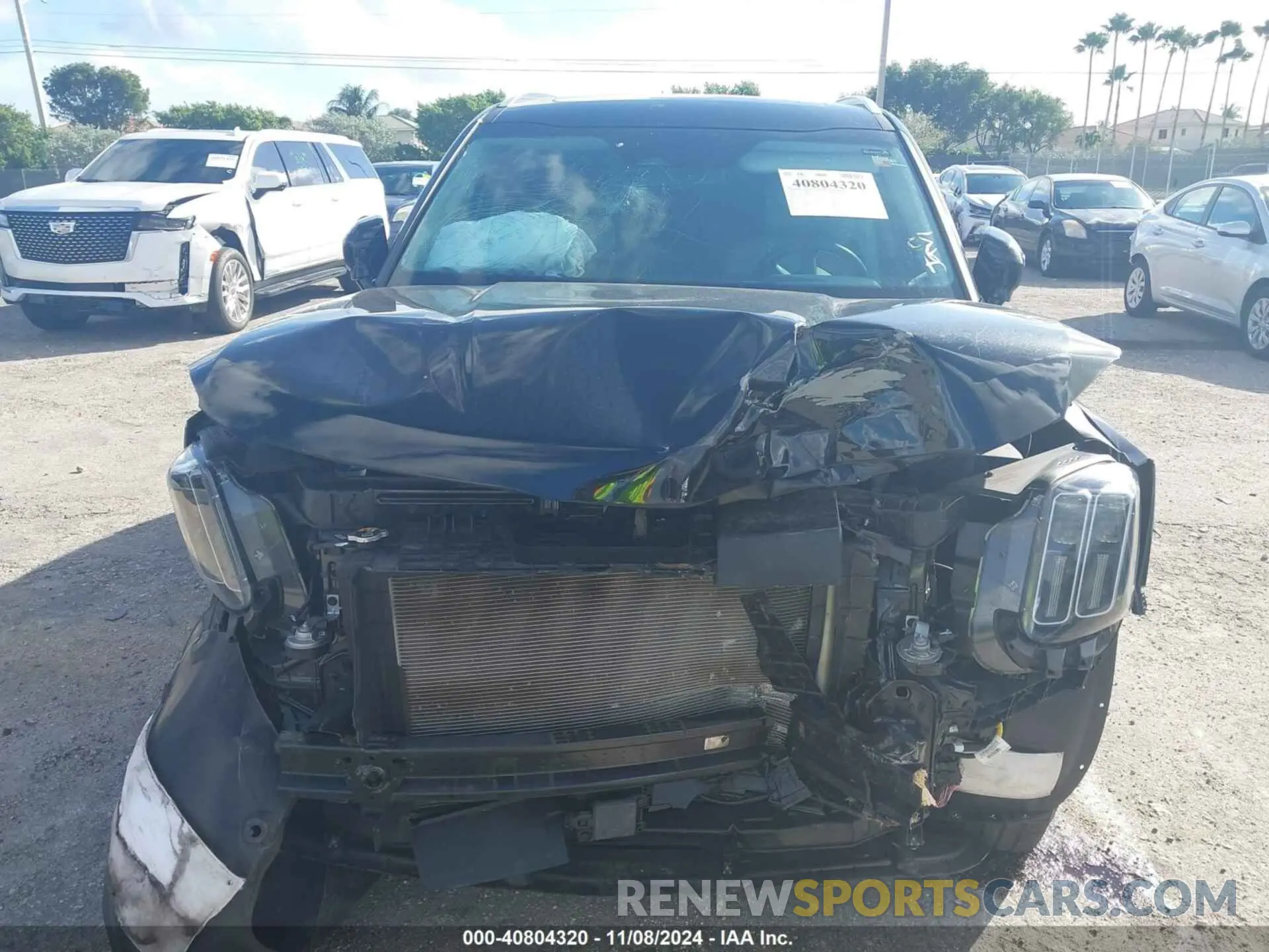 6 Photograph of a damaged car 5XYP54GC9PG401994 KIA TELLURIDE 2023