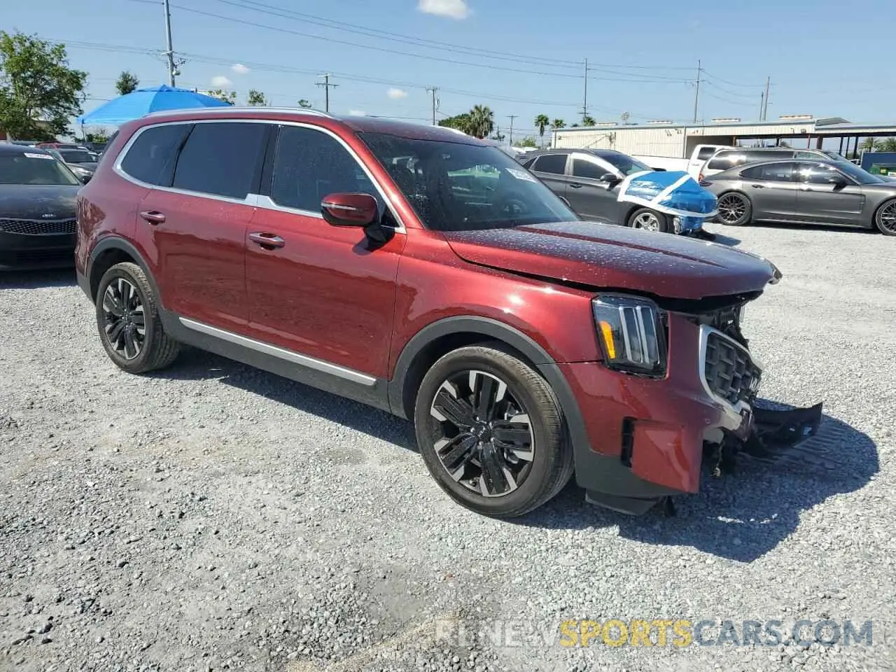 4 Photograph of a damaged car 5XYP5DGC0PG389623 KIA TELLURIDE 2023