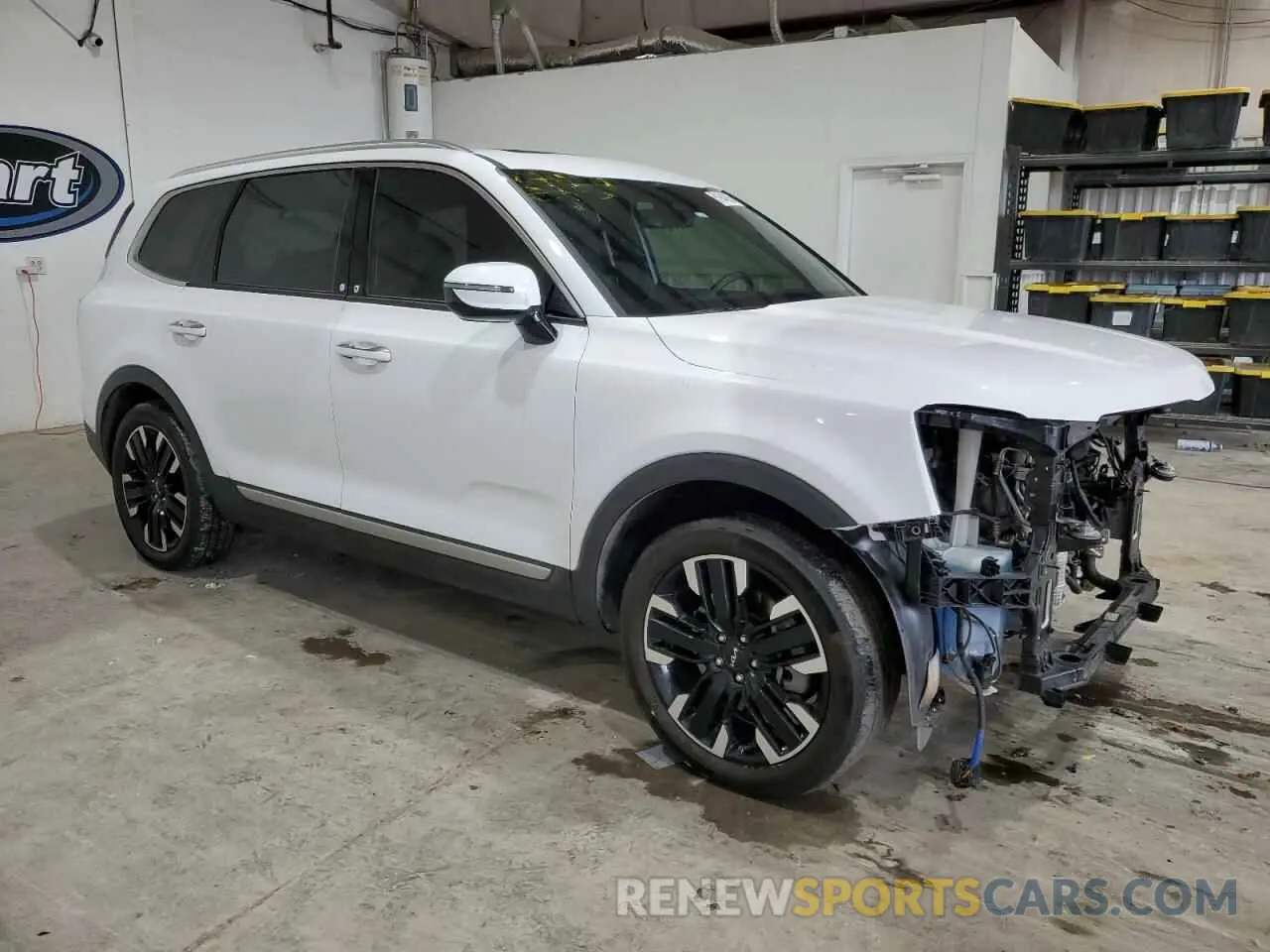 4 Photograph of a damaged car 5XYP5DGC8PG386128 KIA TELLURIDE 2023