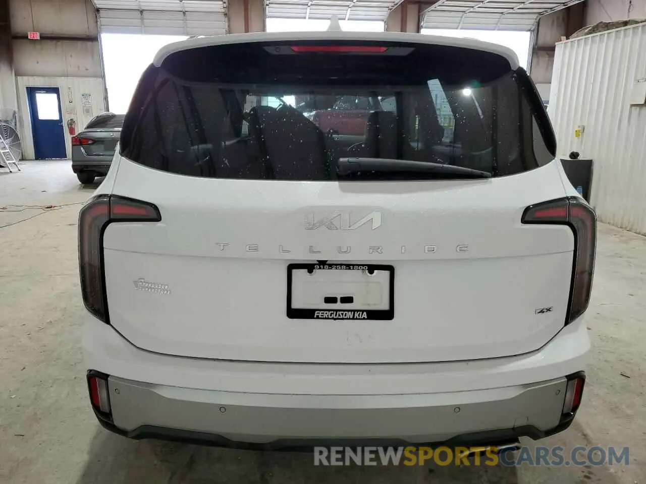 6 Photograph of a damaged car 5XYP5DGC8PG386128 KIA TELLURIDE 2023