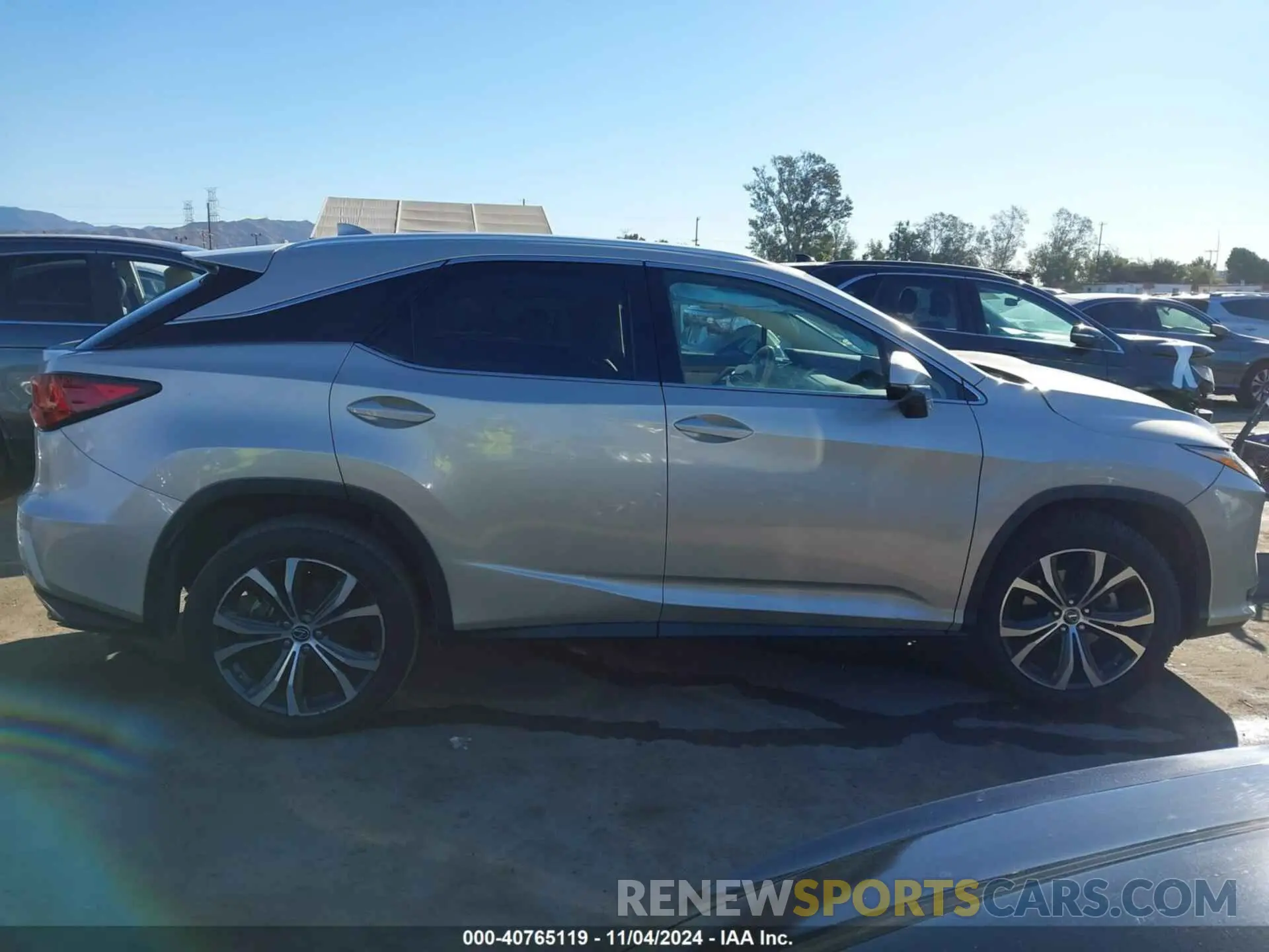 13 Photograph of a damaged car 2T2ZZMCA6KC117921 LEXUS RX 350 2019