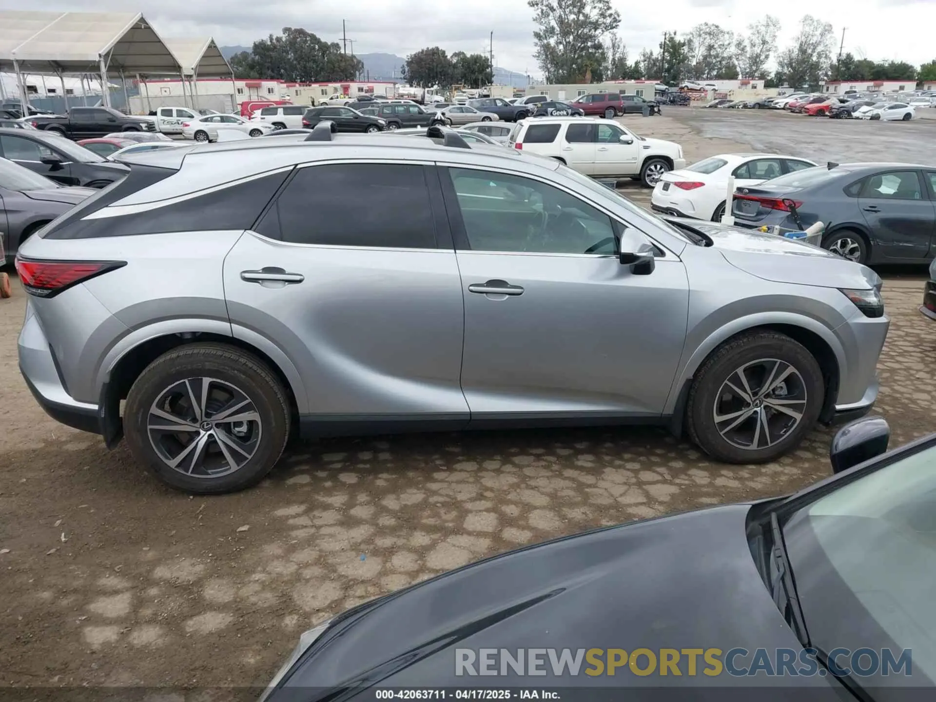 13 Photograph of a damaged car 2T2BBMCA9PC013470 LEXUS RX 350H 2023