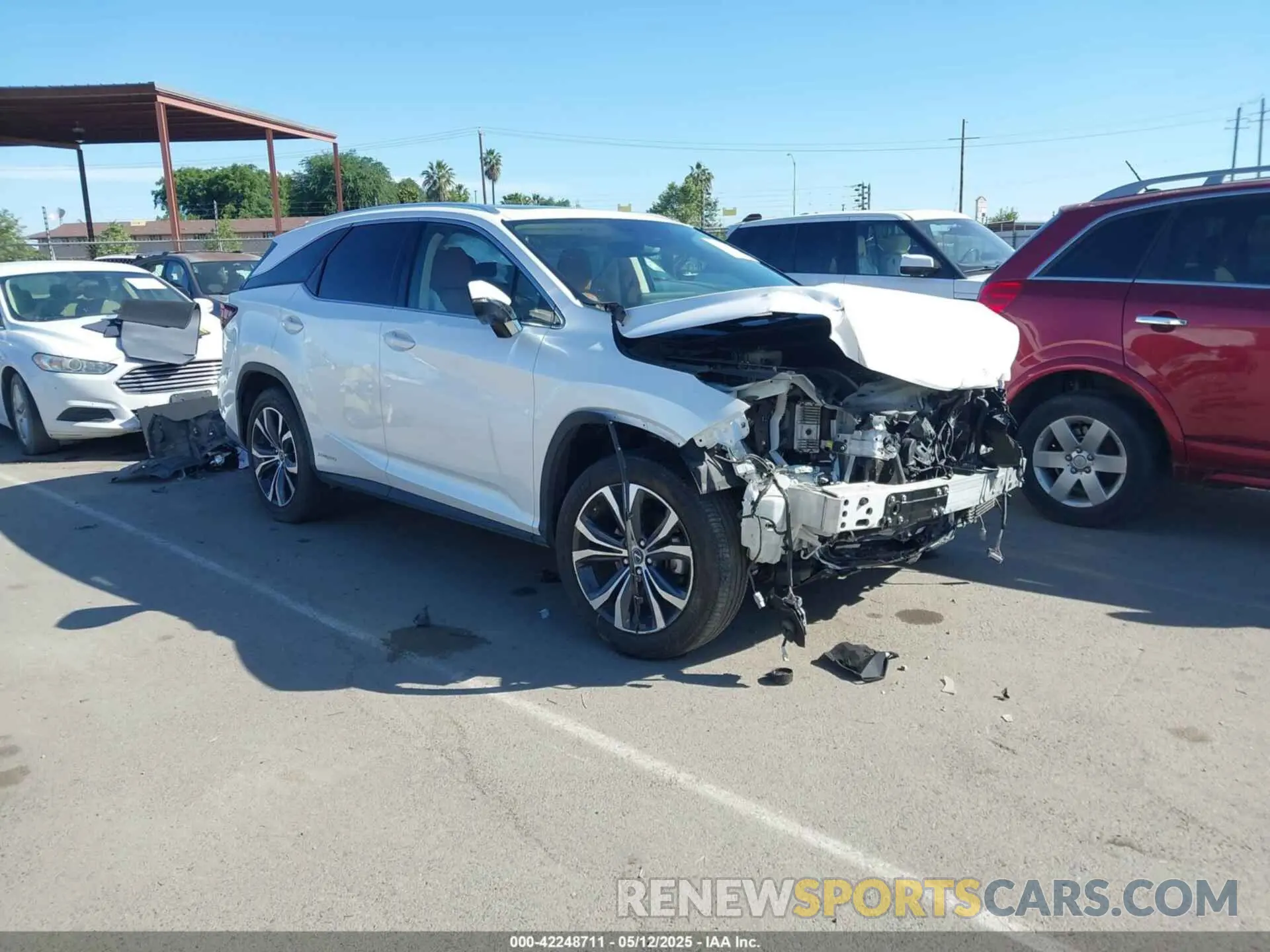 1 Фотография поврежденного автомобиля JTJHGKFA5M2020102 LEXUS RX 450HL 2021