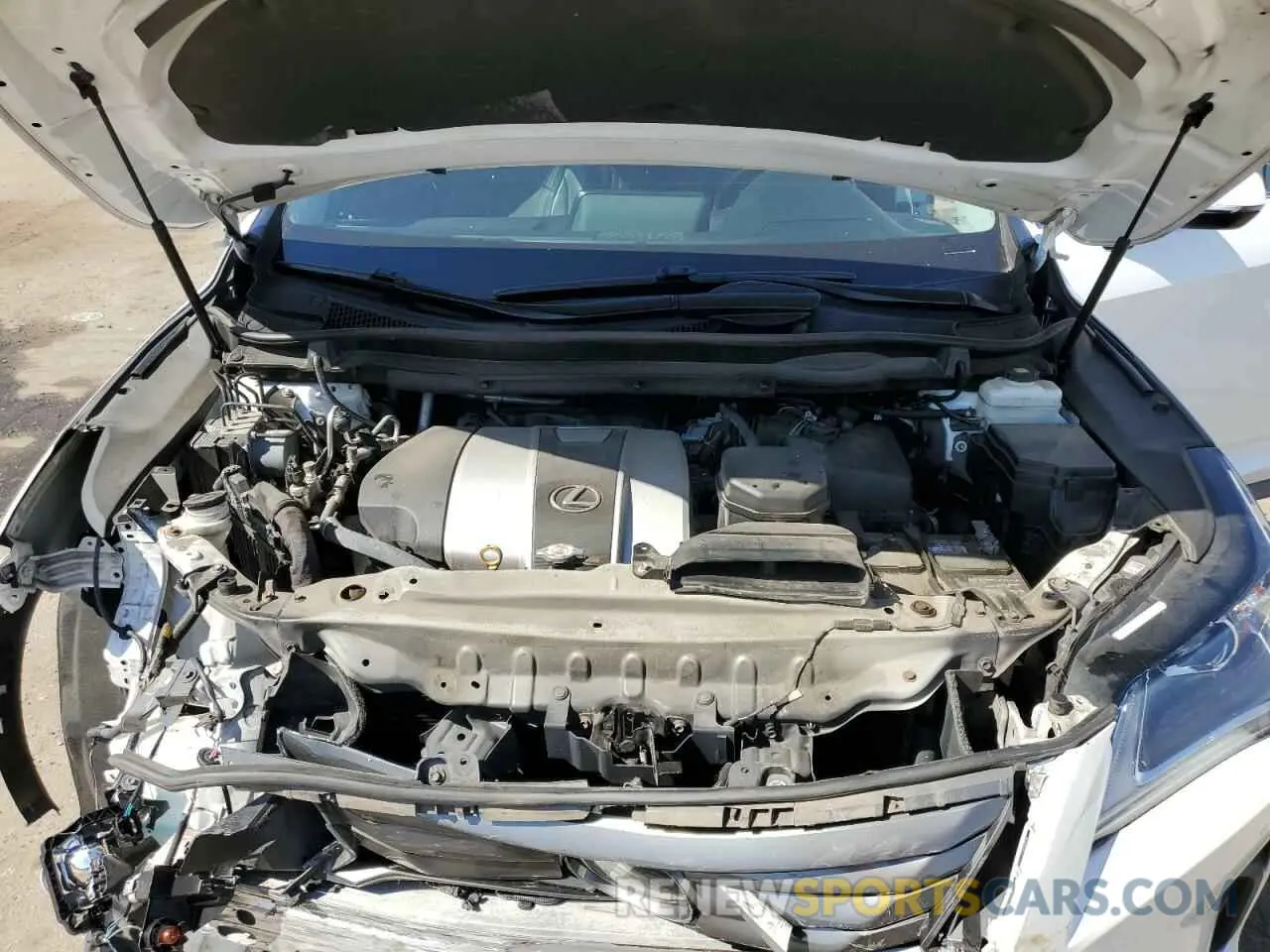 12 Photograph of a damaged car 2T2BZMCAXKC199525 LEXUS RX350 2019