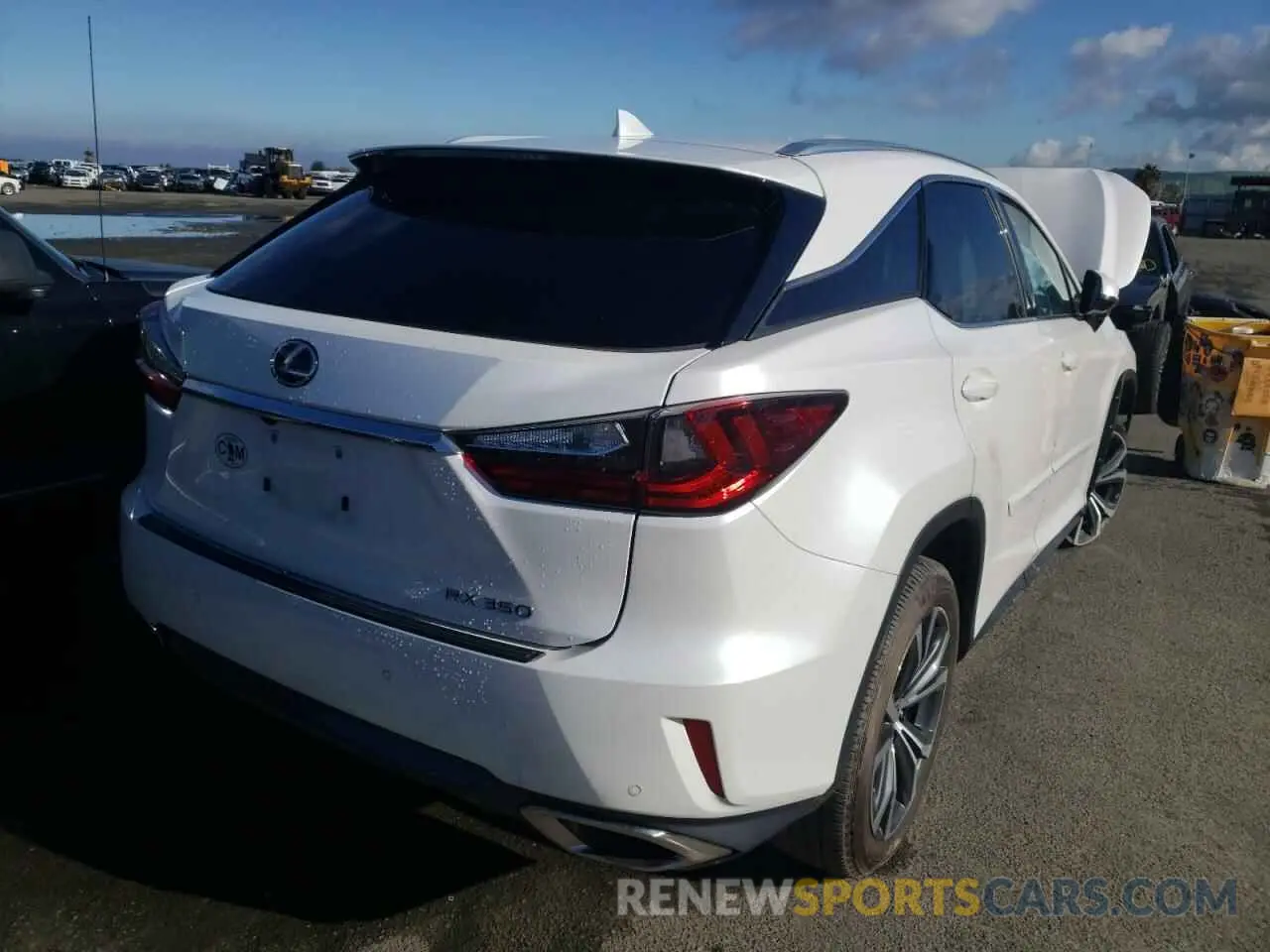 4 Photograph of a damaged car 2T2ZZMCA2KC119794 LEXUS RX350 2019