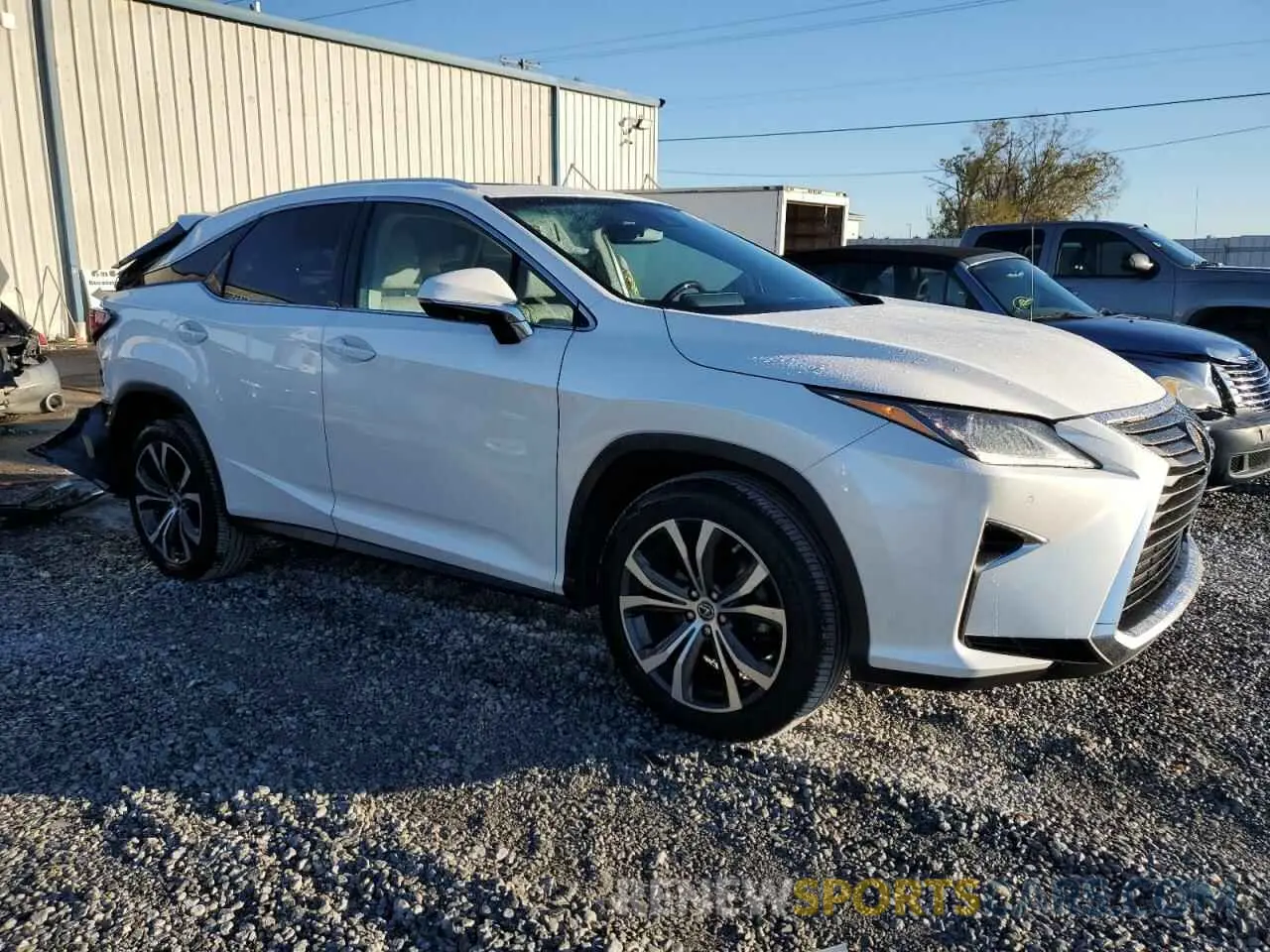 4 Photograph of a damaged car 2T2ZZMCA8KC133540 LEXUS RX350 2019
