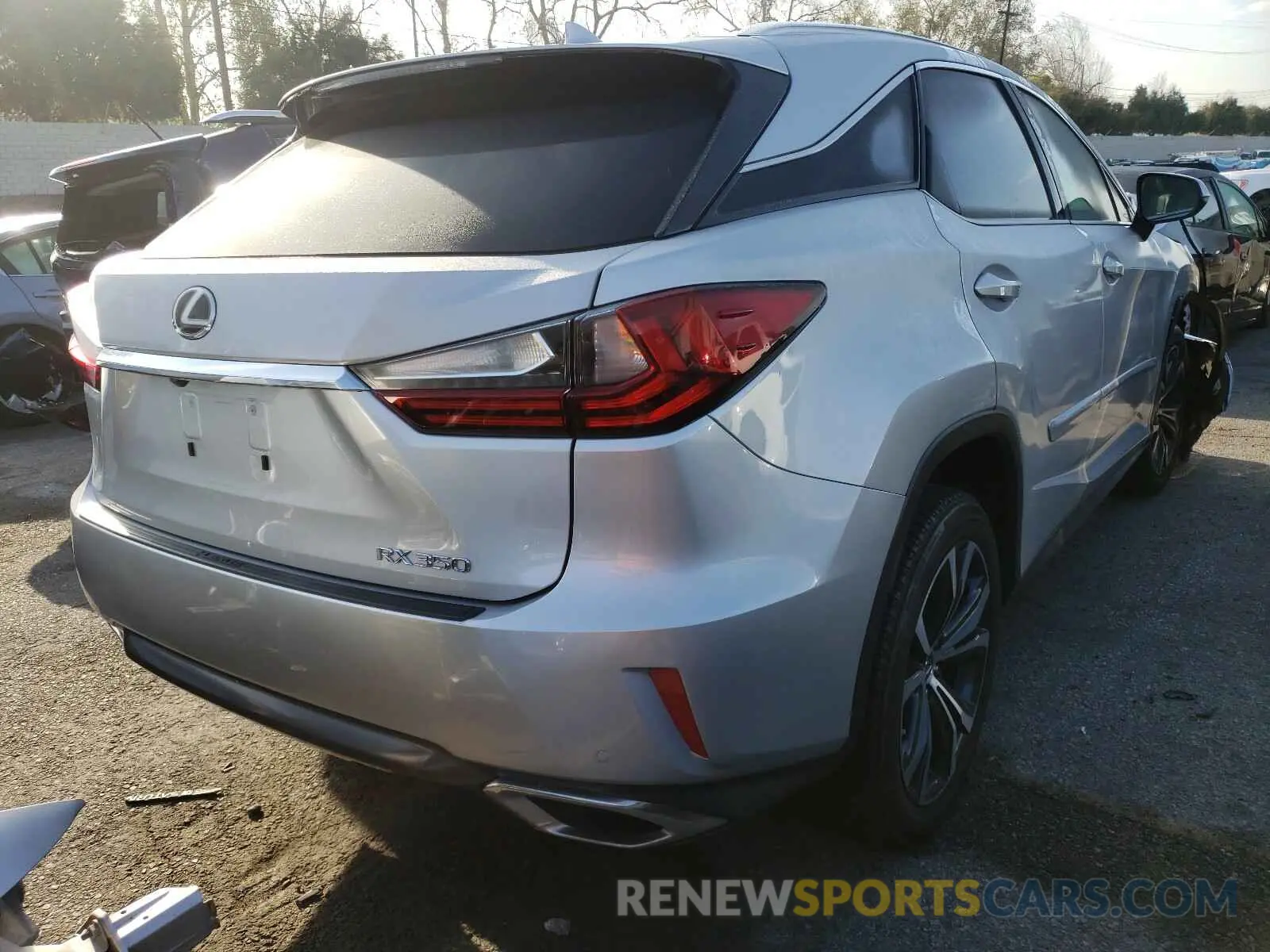 4 Photograph of a damaged car 2T2ZZMCAXKC133698 LEXUS RX350 2019