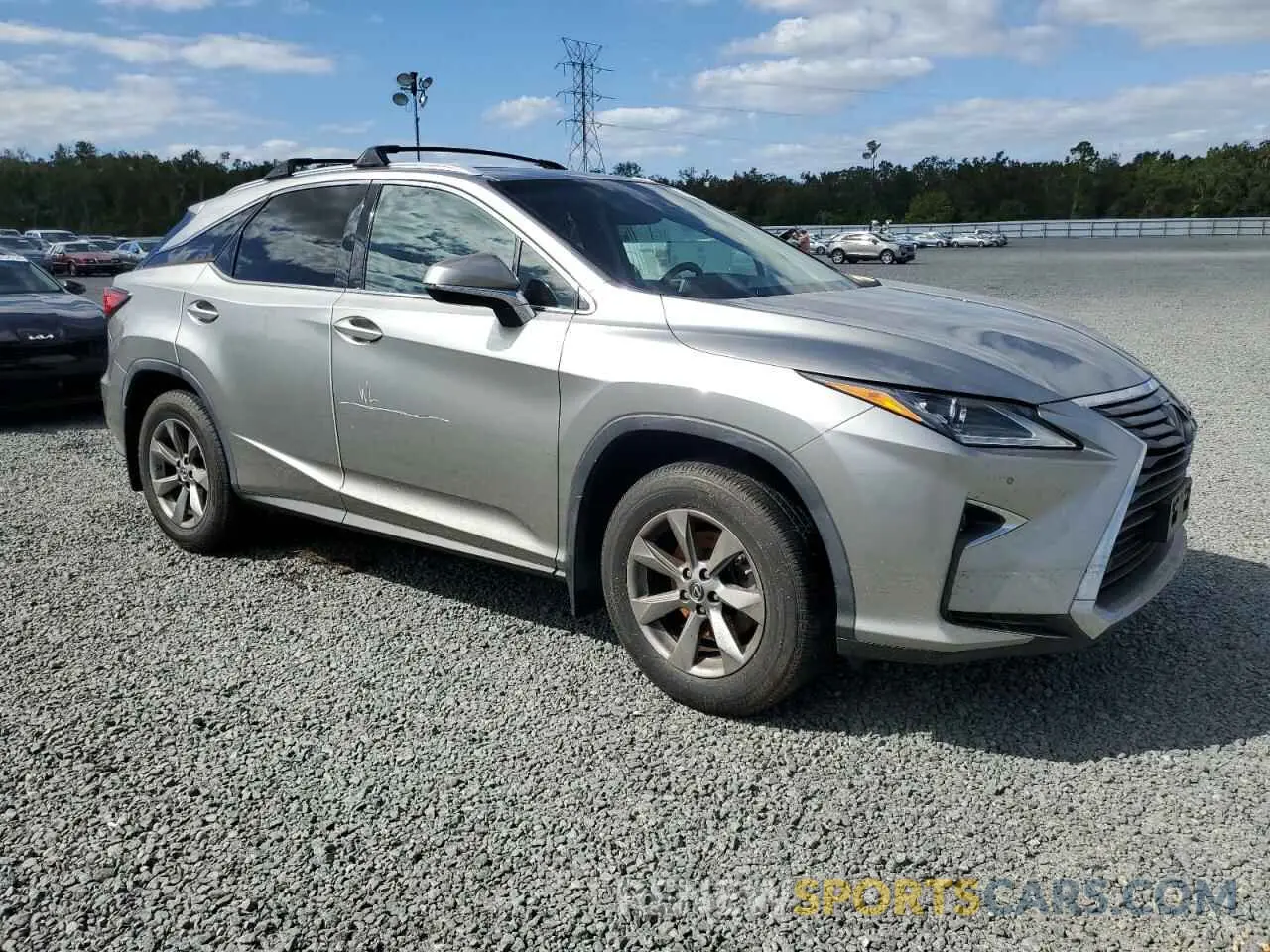 4 Photograph of a damaged car JTJBZMCA8K2041572 LEXUS RX350 2019