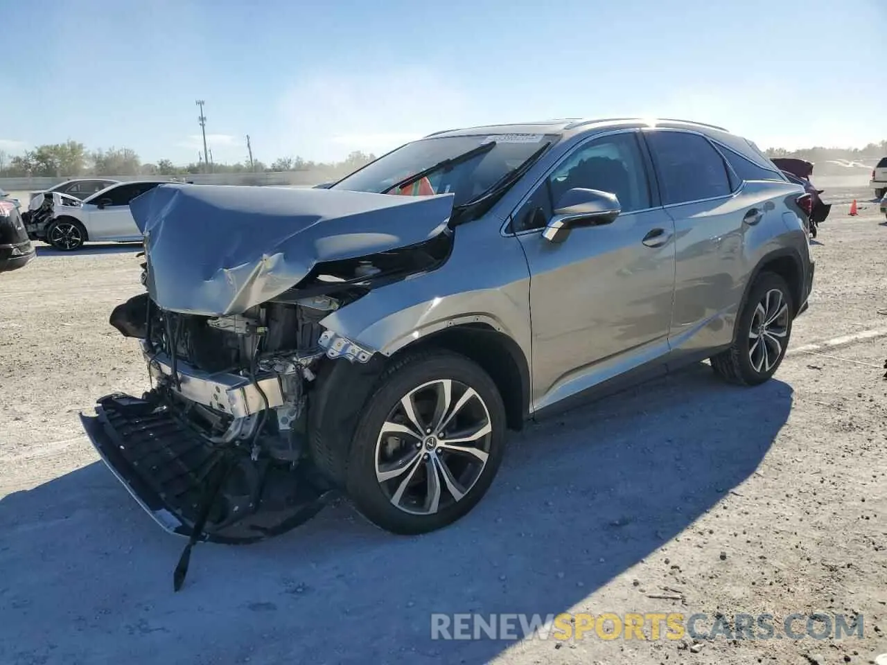 1 Photograph of a damaged car 2T2HZMDA4LC243917 LEXUS RX350 2020
