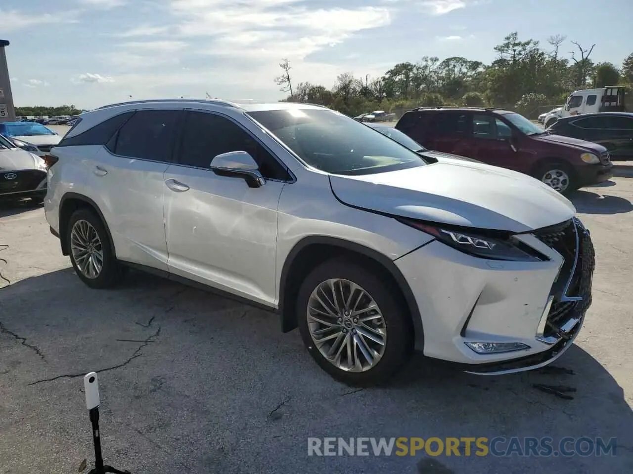 4 Photograph of a damaged car JTJJZKEAXN2025939 LEXUS RX350 2022
