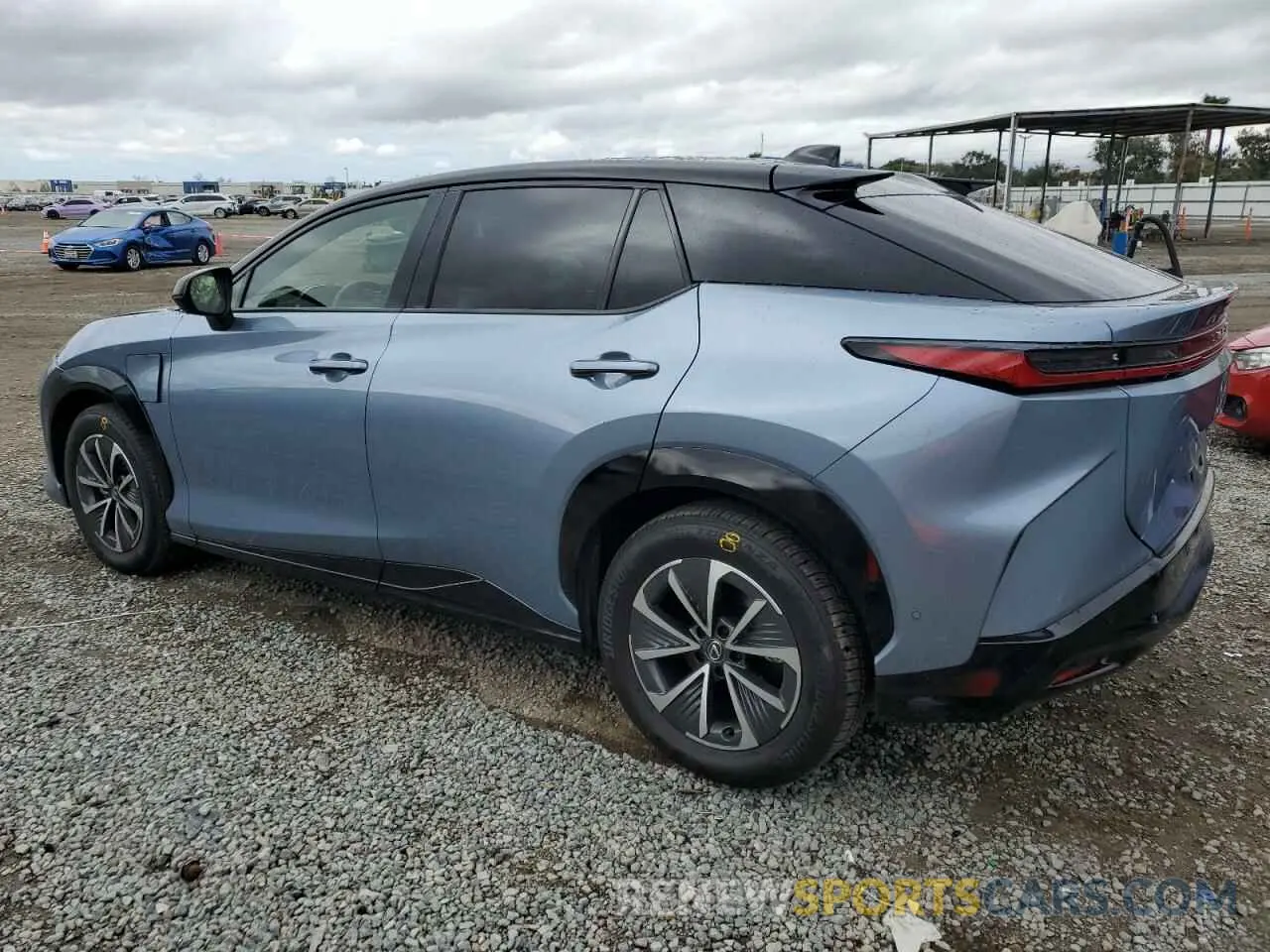 2 Фотография поврежденного автомобиля JTJAAAAB6PA009956 LEXUS RZ 450E 2023
