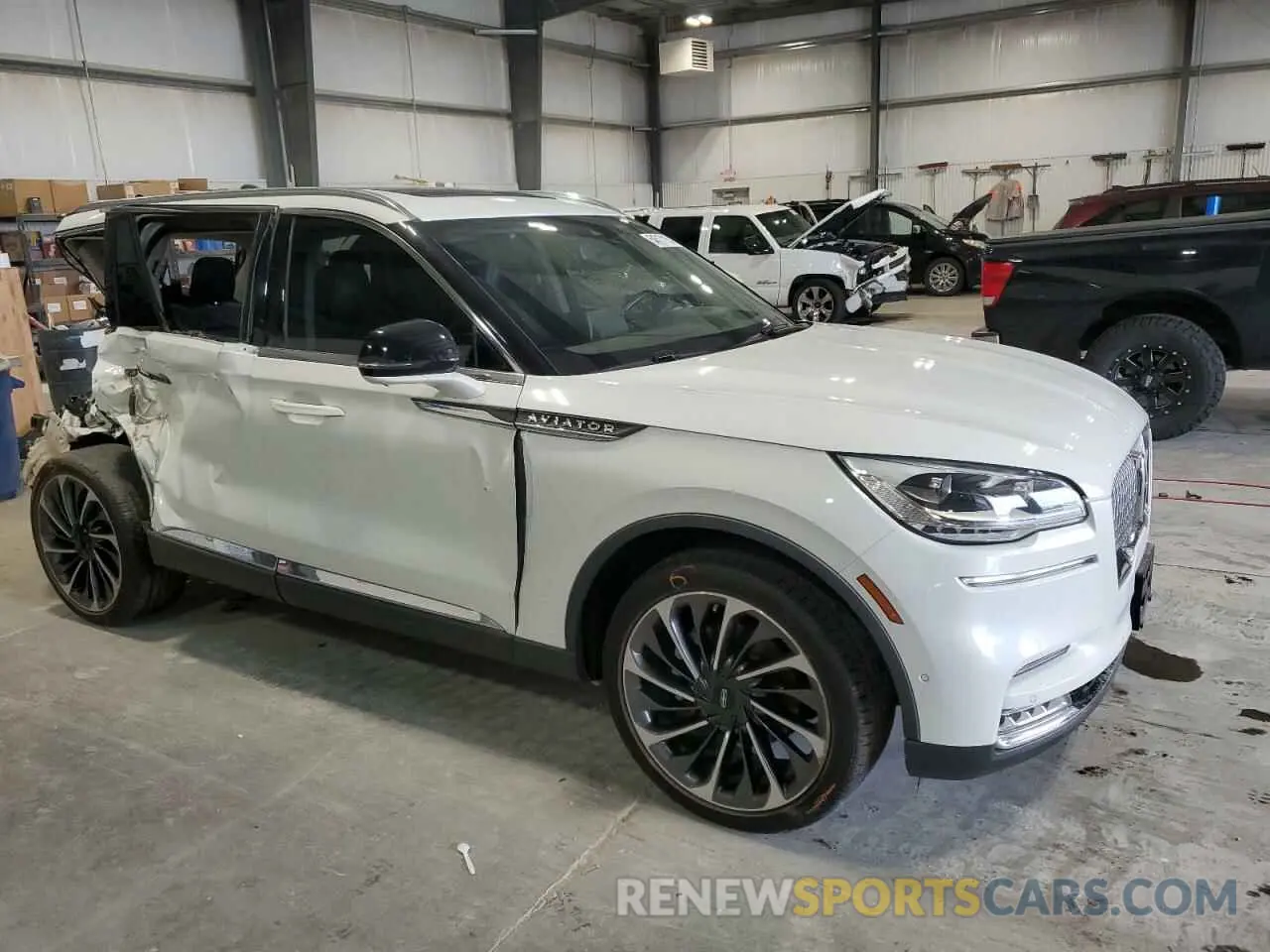 4 Photograph of a damaged car 5LM5J7XCXLGL02153 LINCOLN AVIATOR 2020