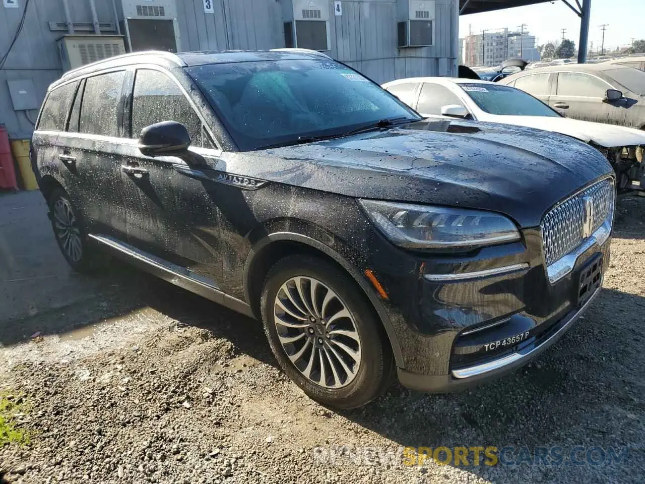 4 Photograph of a damaged car 5LM5J7WC8PGL06144 LINCOLN AVIATOR 2023