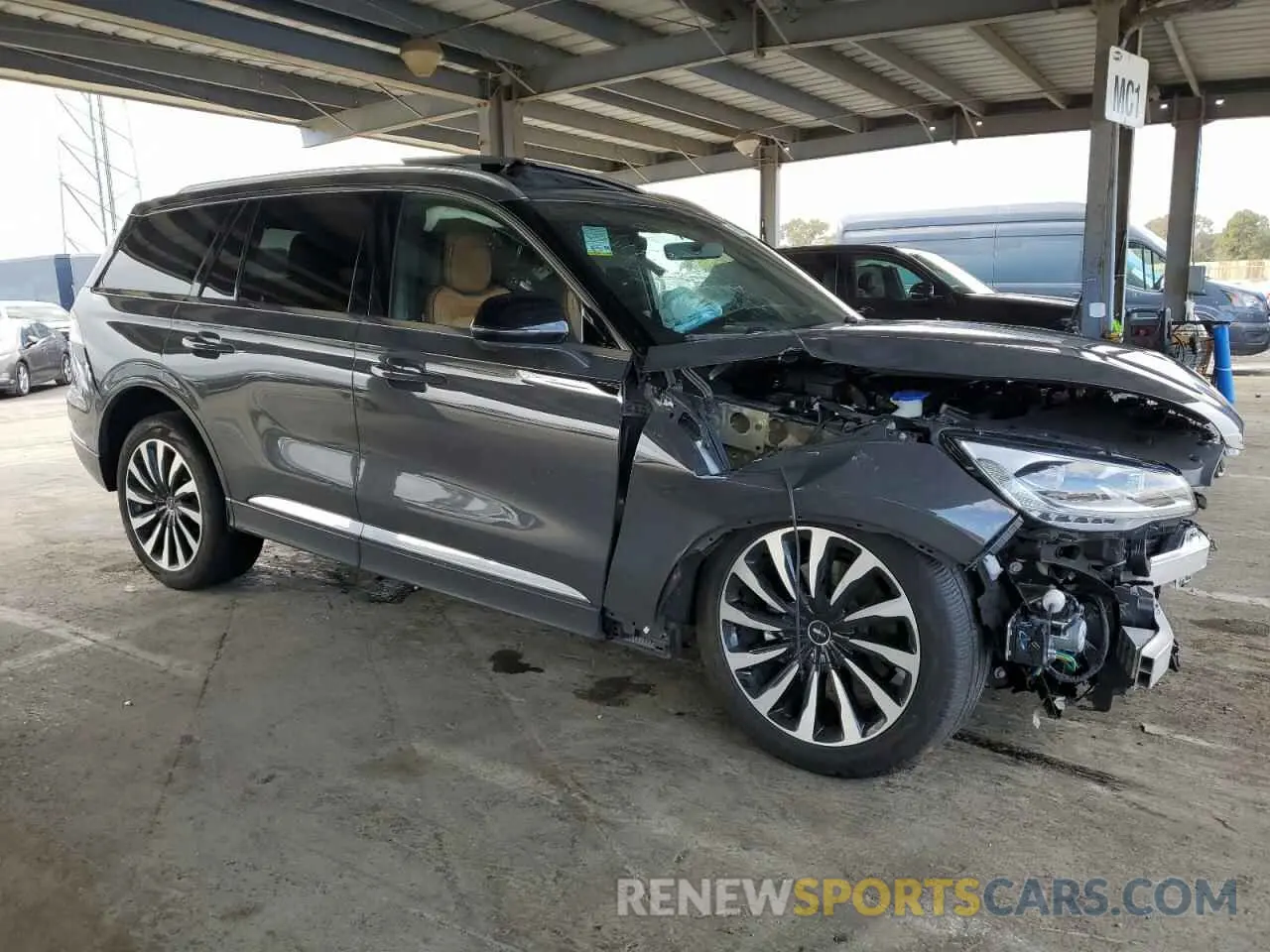 4 Photograph of a damaged car 5LMYJ9YY3PNL03049 LINCOLN AVIATOR 2023