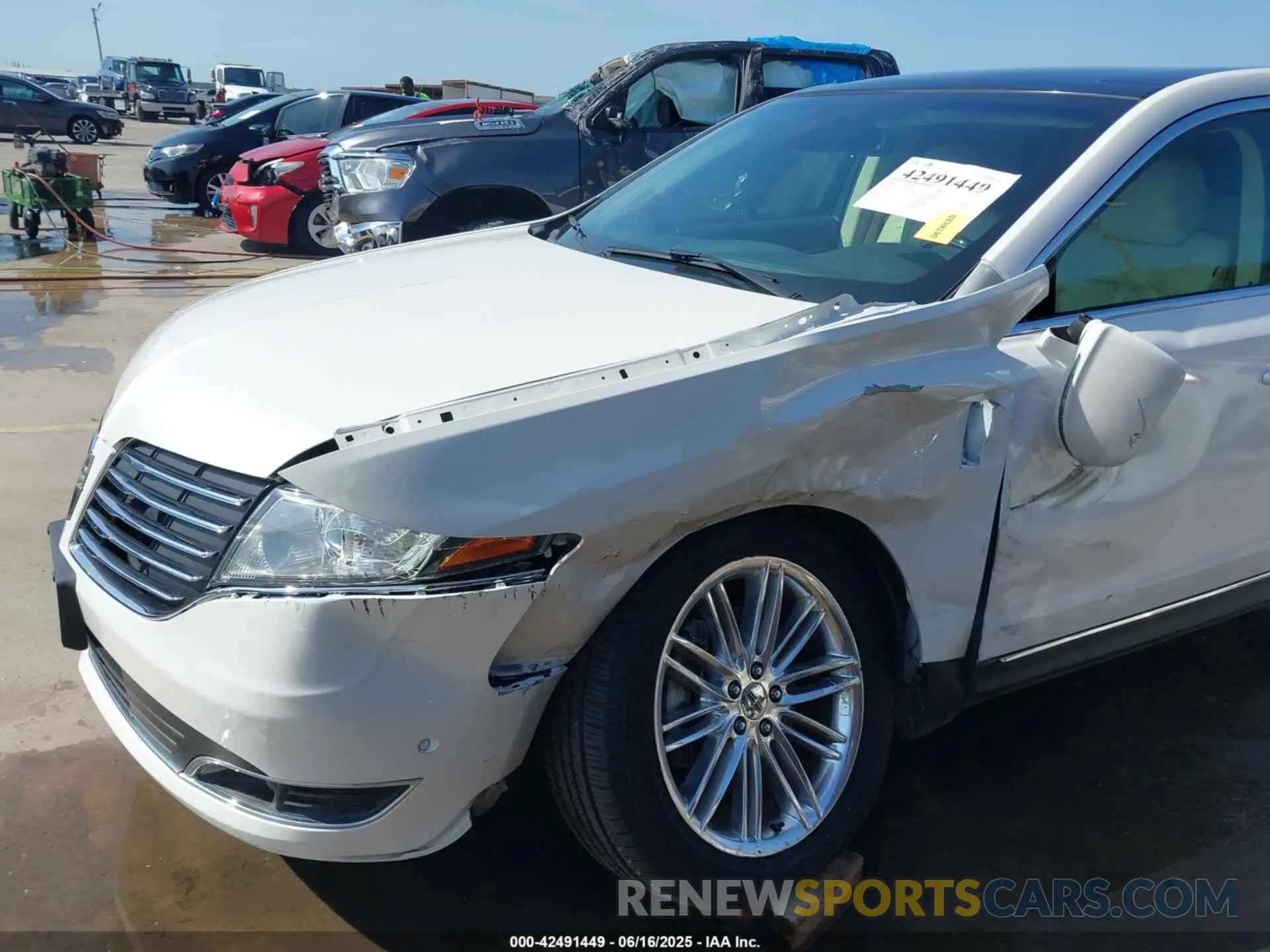 6 Photograph of a damaged car 2LMHJ5AT1KBL03571 LINCOLN MKT 2019