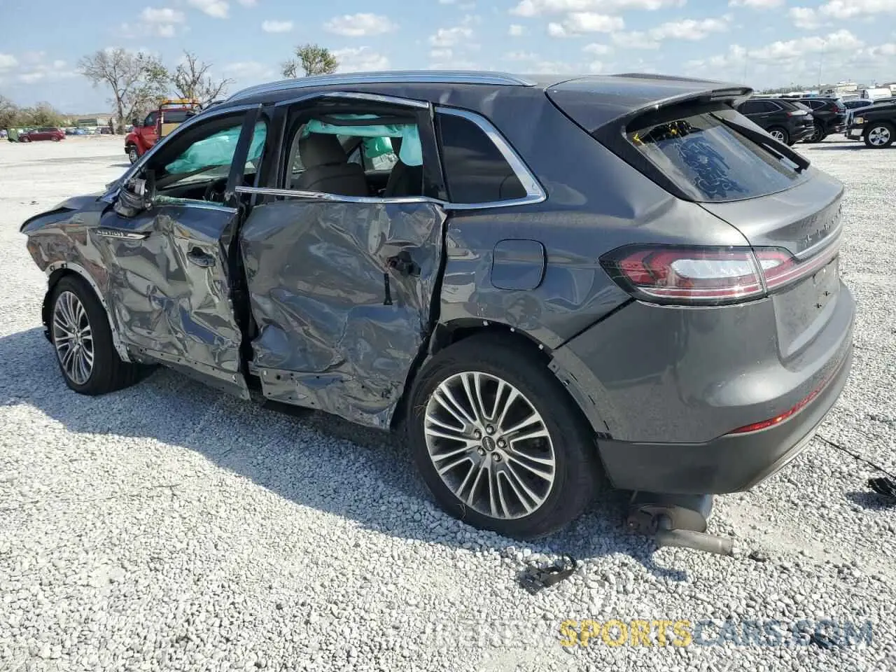 2 Photograph of a damaged car 2LMPJ6J98NBL20832 LINCOLN NAUTILUS 2022