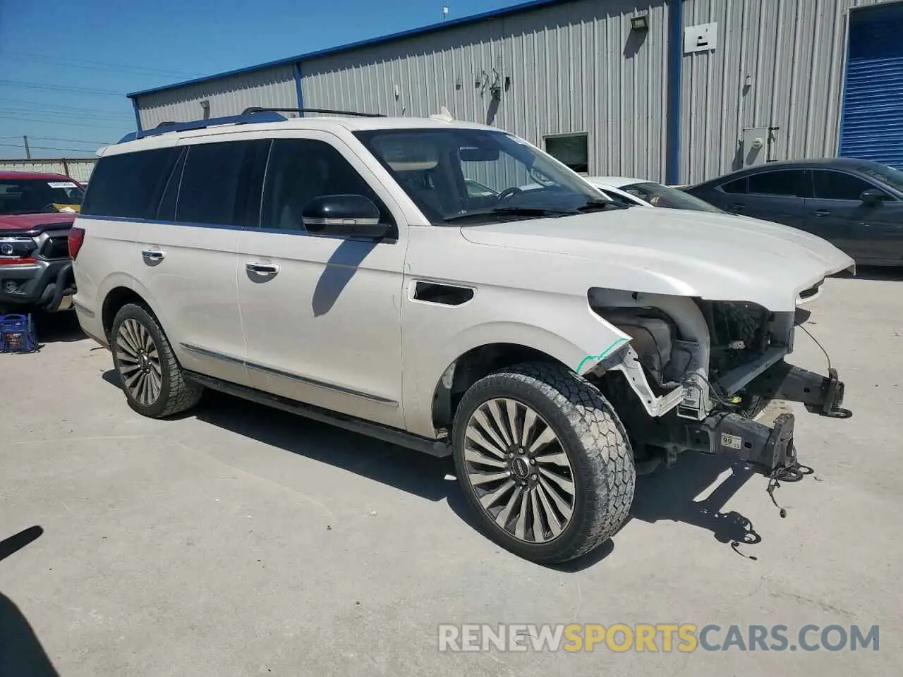 4 Photograph of a damaged car 5LMJJ2LT9KEL24193 LINCOLN NAVIGATOR 2019