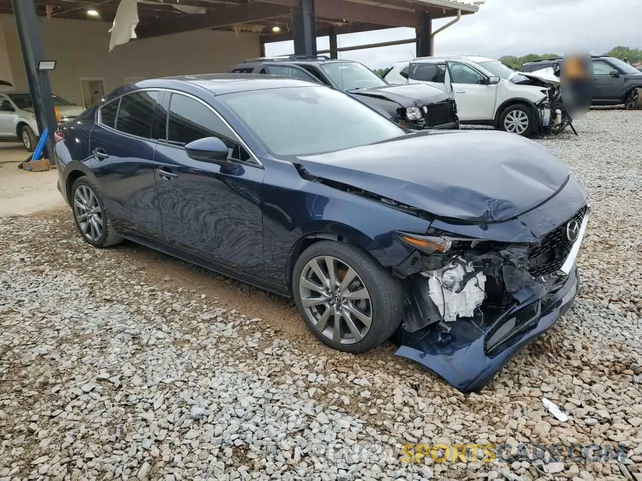 4 Photograph of a damaged car 3MZBPBDM2PM351476 MAZDA 3 2023