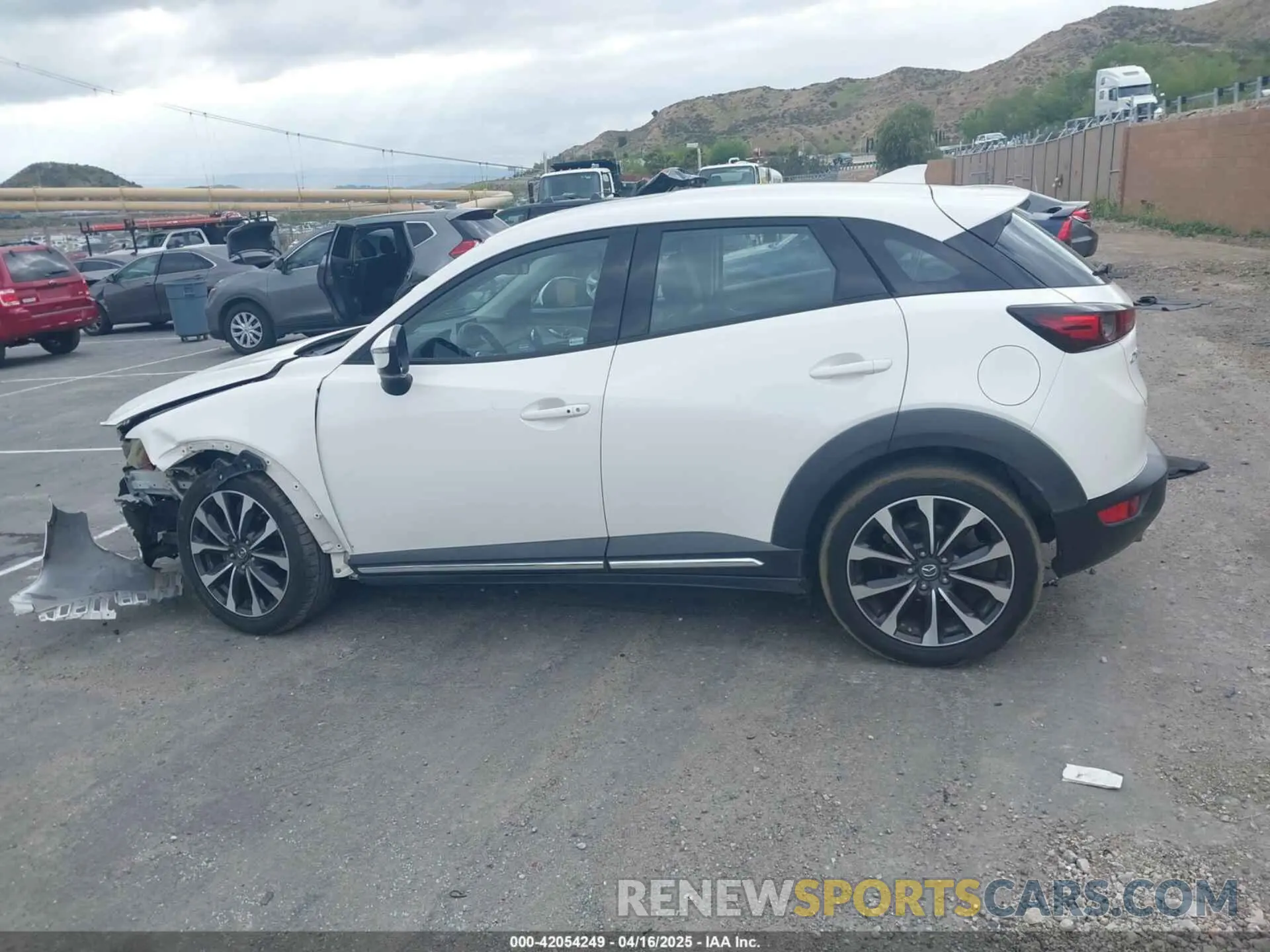 13 Photograph of a damaged car JM1DKDD77K0411859 MAZDA CX-3 2019