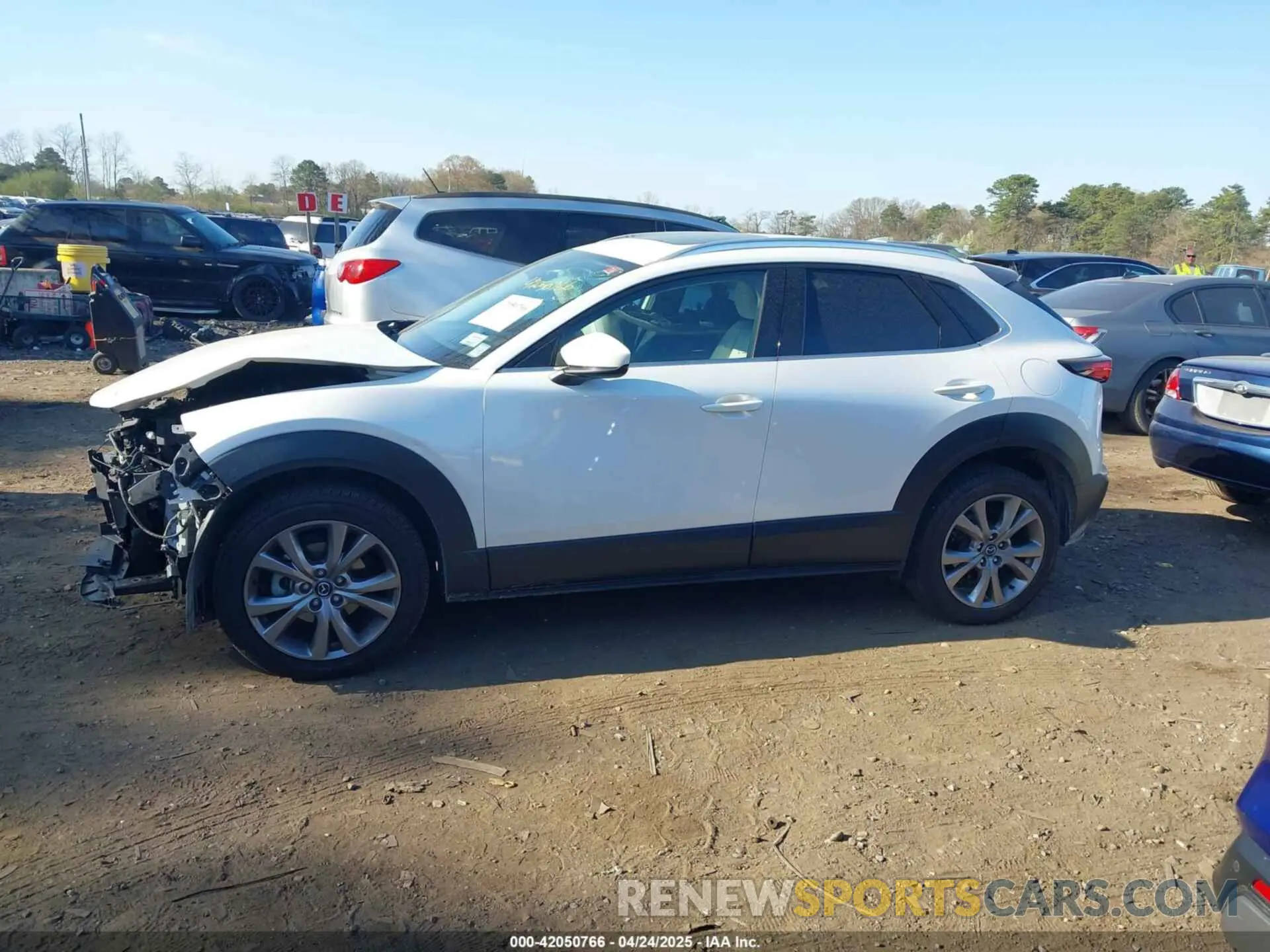 14 Фотография поврежденного автомобиля 3MVDMBDM0MM237278 MAZDA CX-30 2021