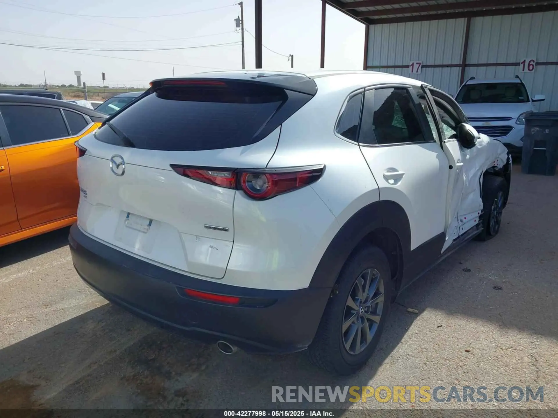 4 Photograph of a damaged car 3MVDMBAL9NM415797 MAZDA CX-30 2022