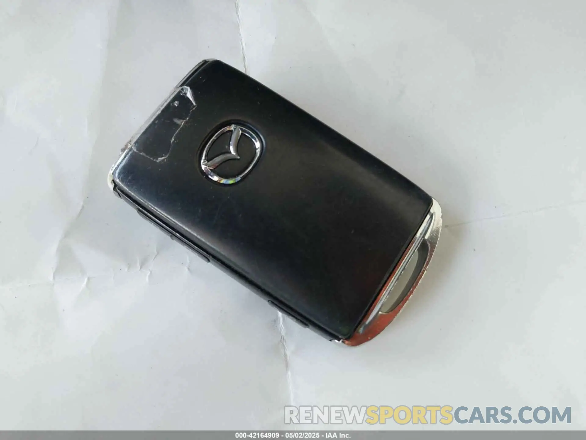 11 Фотография поврежденного автомобиля 3MVDMBBL2NM417034 MAZDA CX-30 2022