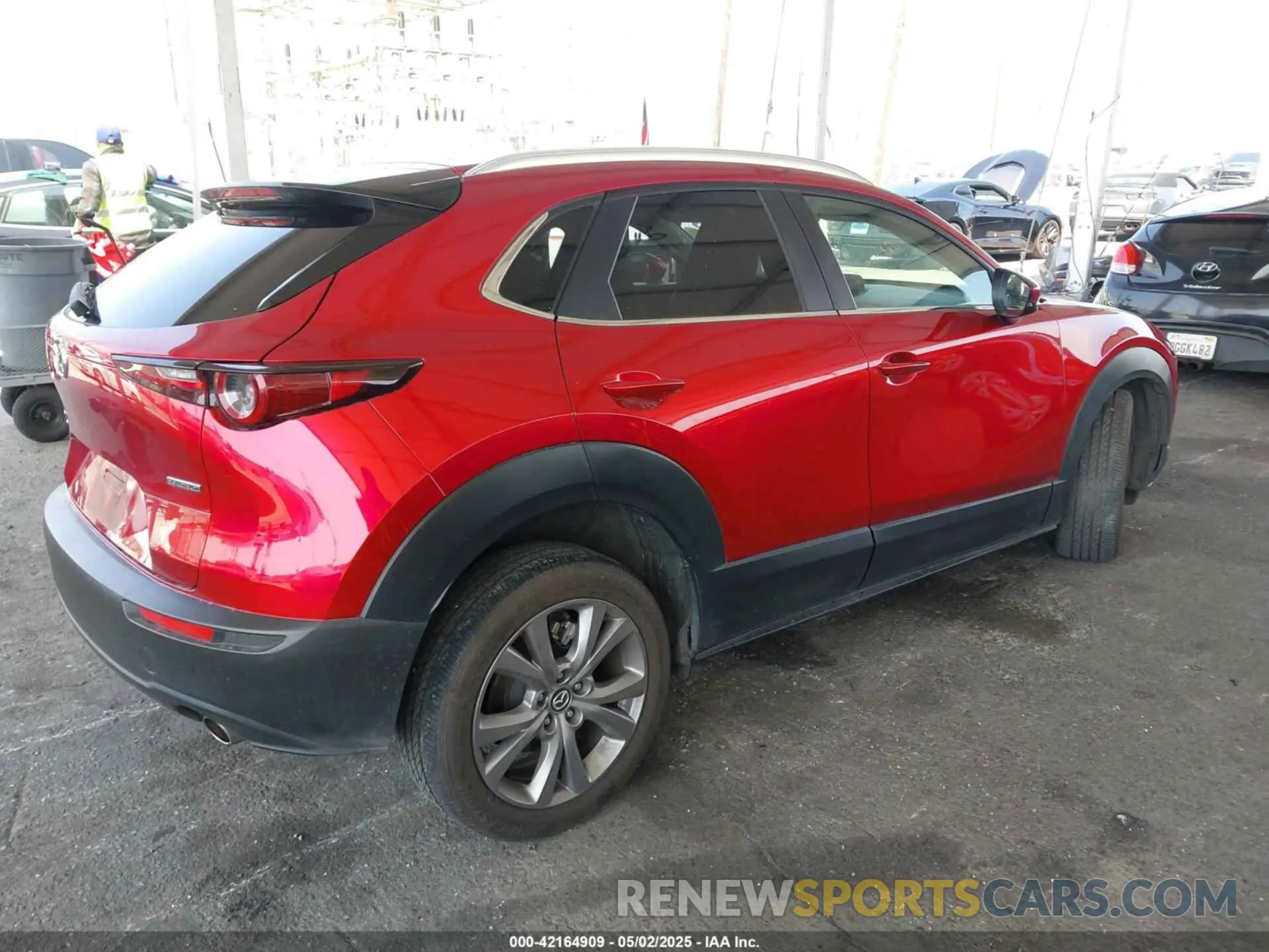 4 Фотография поврежденного автомобиля 3MVDMBBL2NM417034 MAZDA CX-30 2022