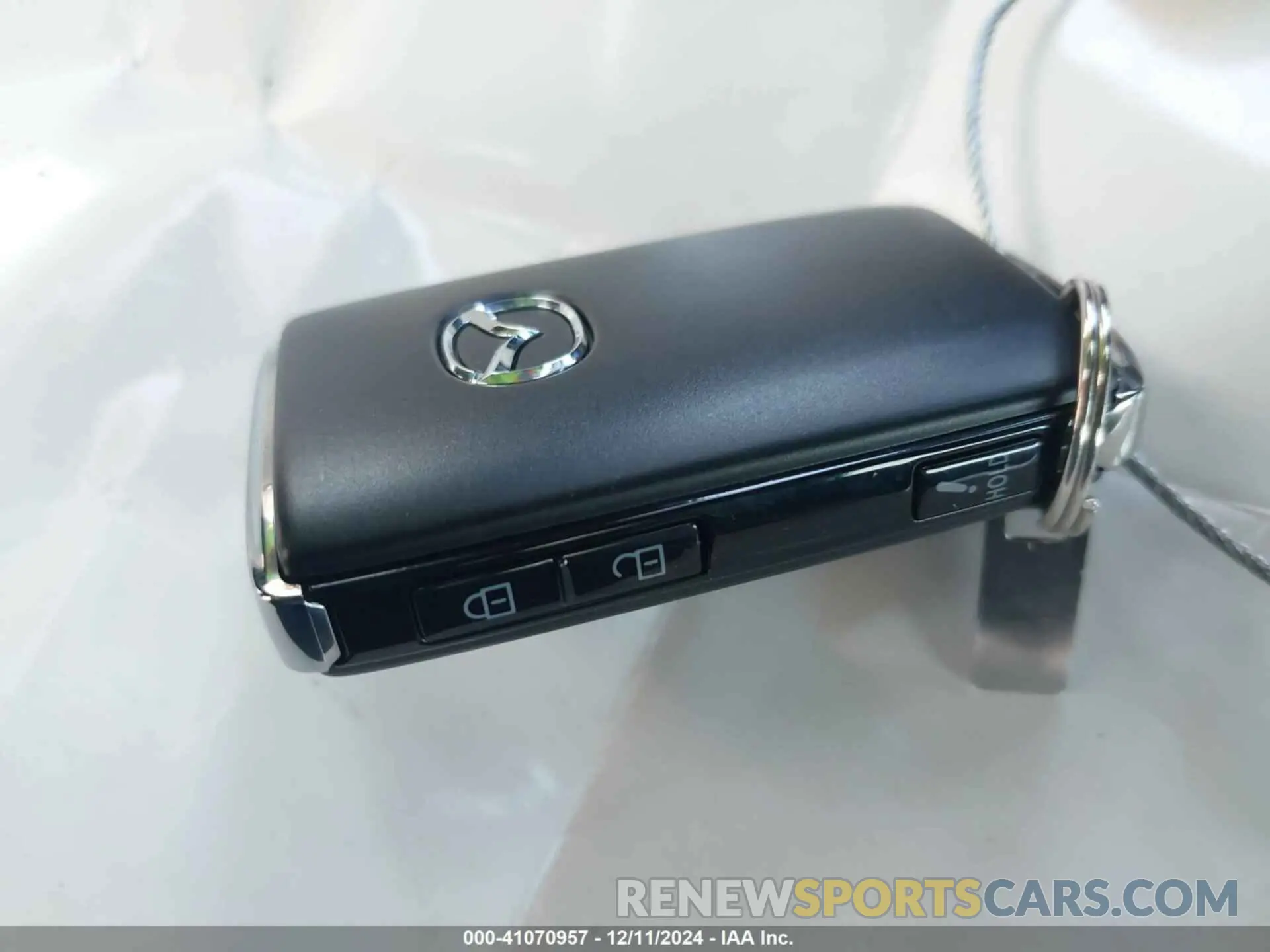 11 Фотография поврежденного автомобиля 3MVDMBBL9NM411585 MAZDA CX-30 2022