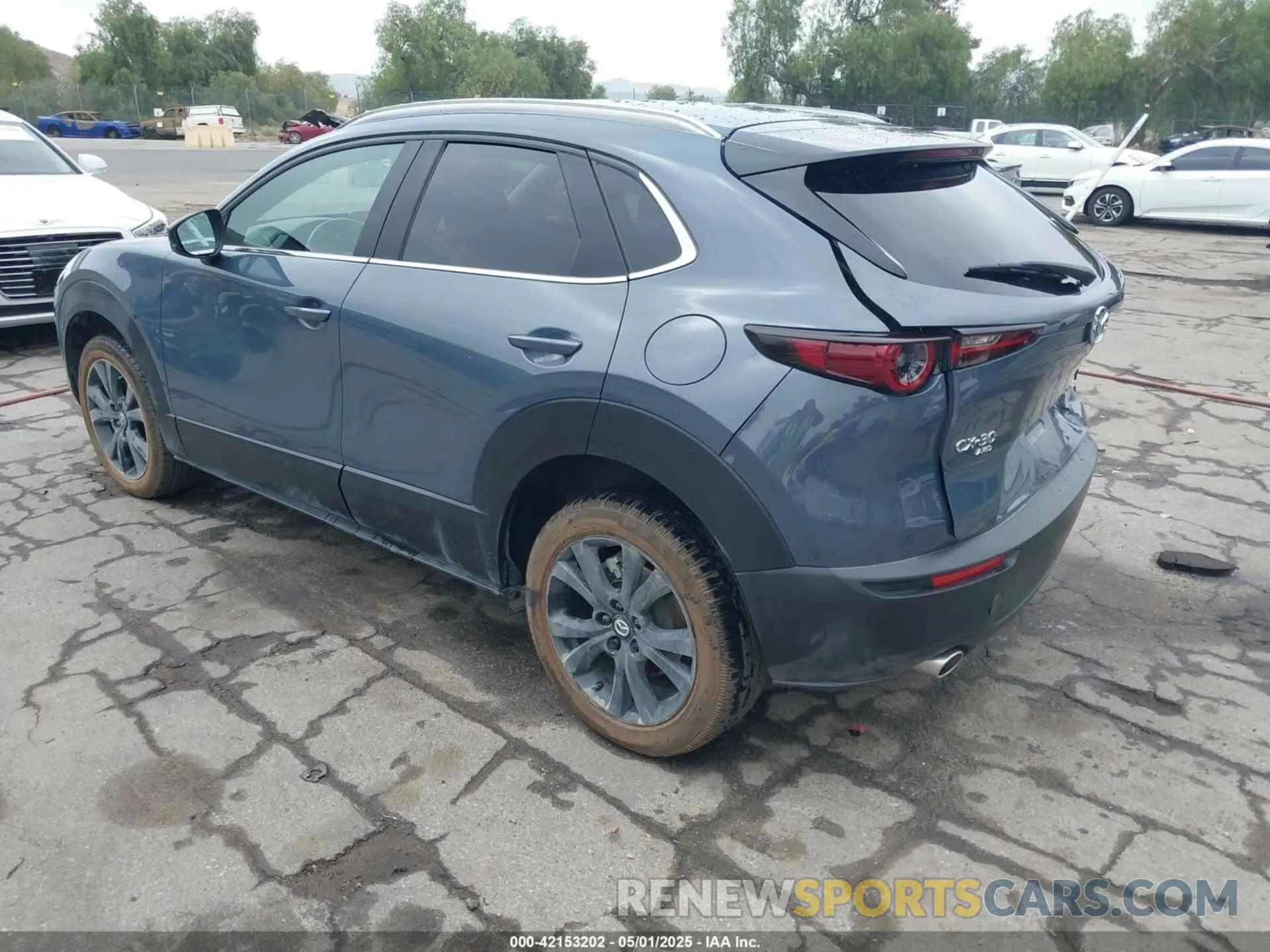 3 Фотография поврежденного автомобиля 3MVDMBCL0NM456154 MAZDA CX-30 2022