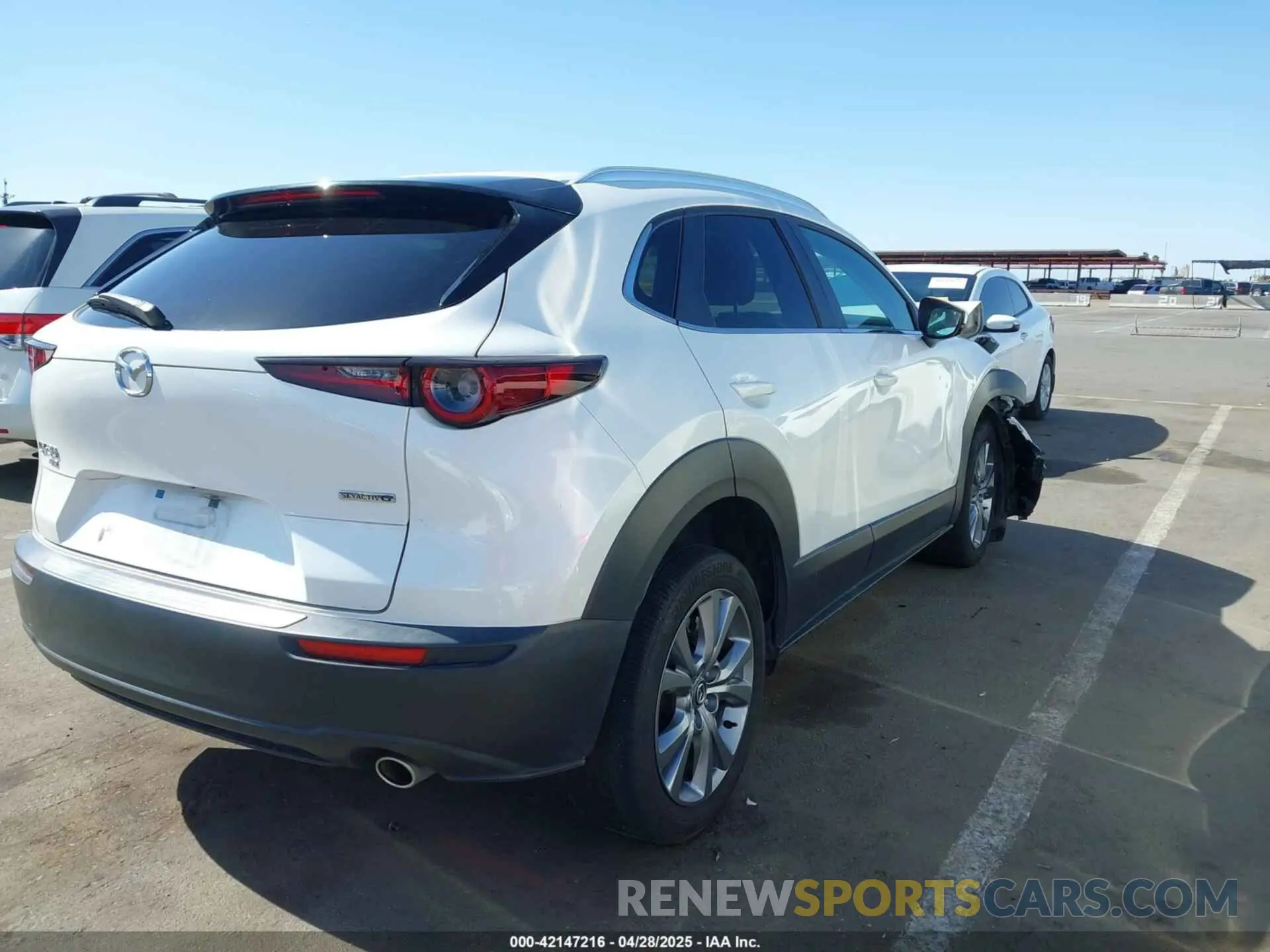 4 Photograph of a damaged car 3MVDMBCL4NM454228 MAZDA CX-30 2022