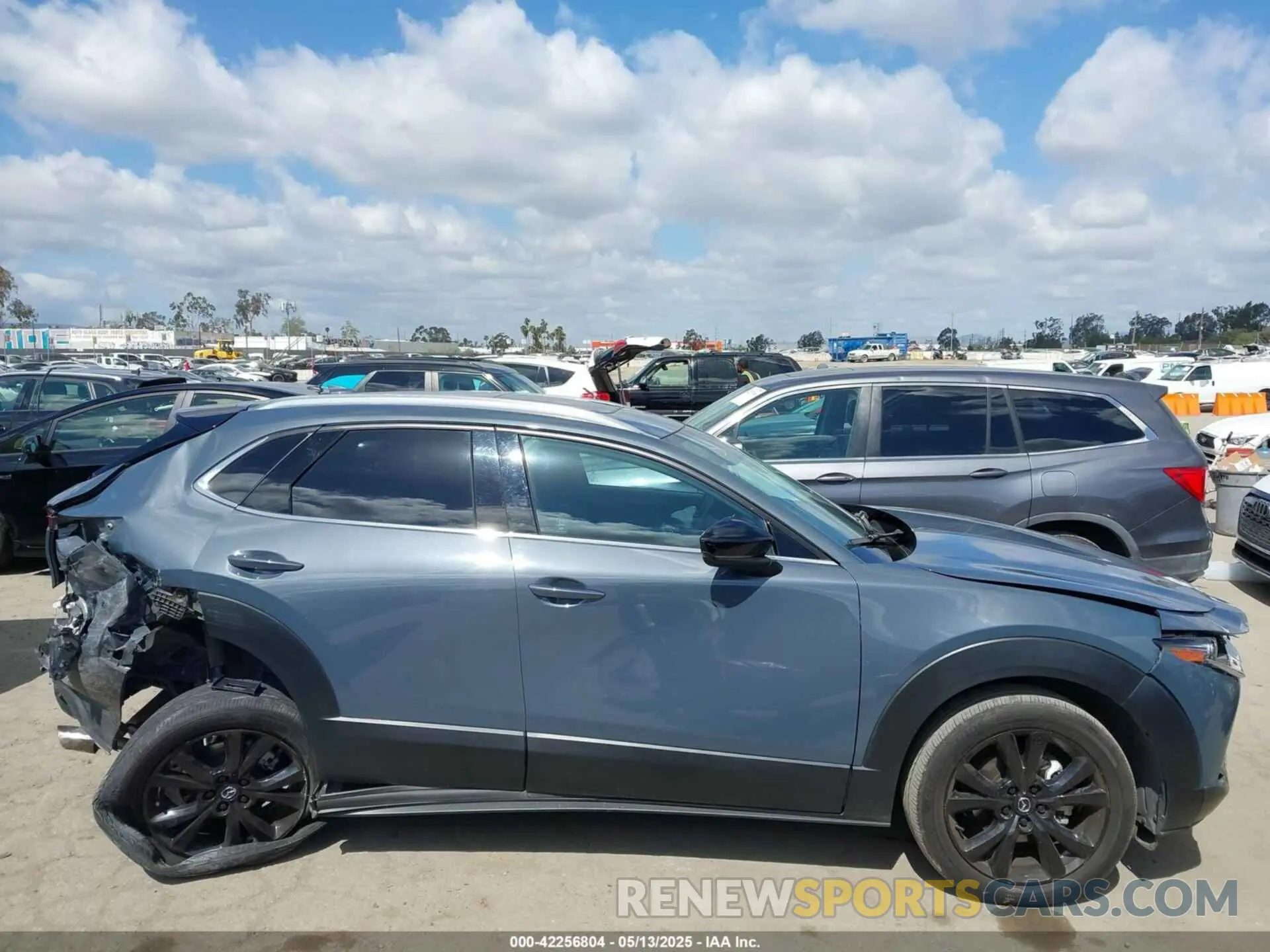 14 Фотография поврежденного автомобиля 3MVDMBEY2NM447805 MAZDA CX-30 2022